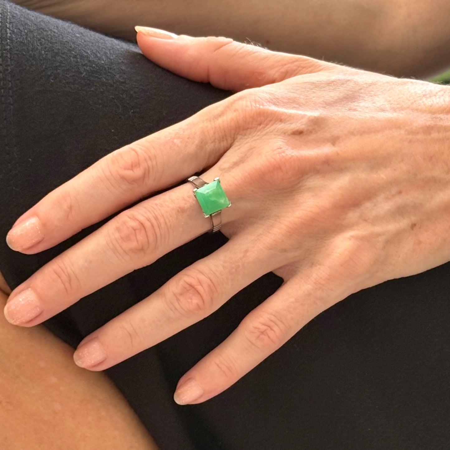 Green quartz ring in white gold plated sterling silver, featuring a square-cut translucent green gemstone with bright, natural brilliance, elegant modern design.
