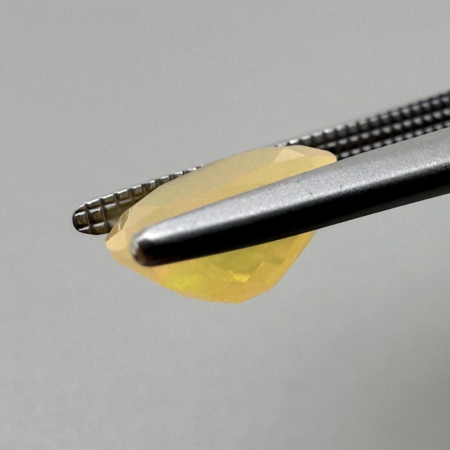 Natural Milky Yellow Opal gemstone, oval cut