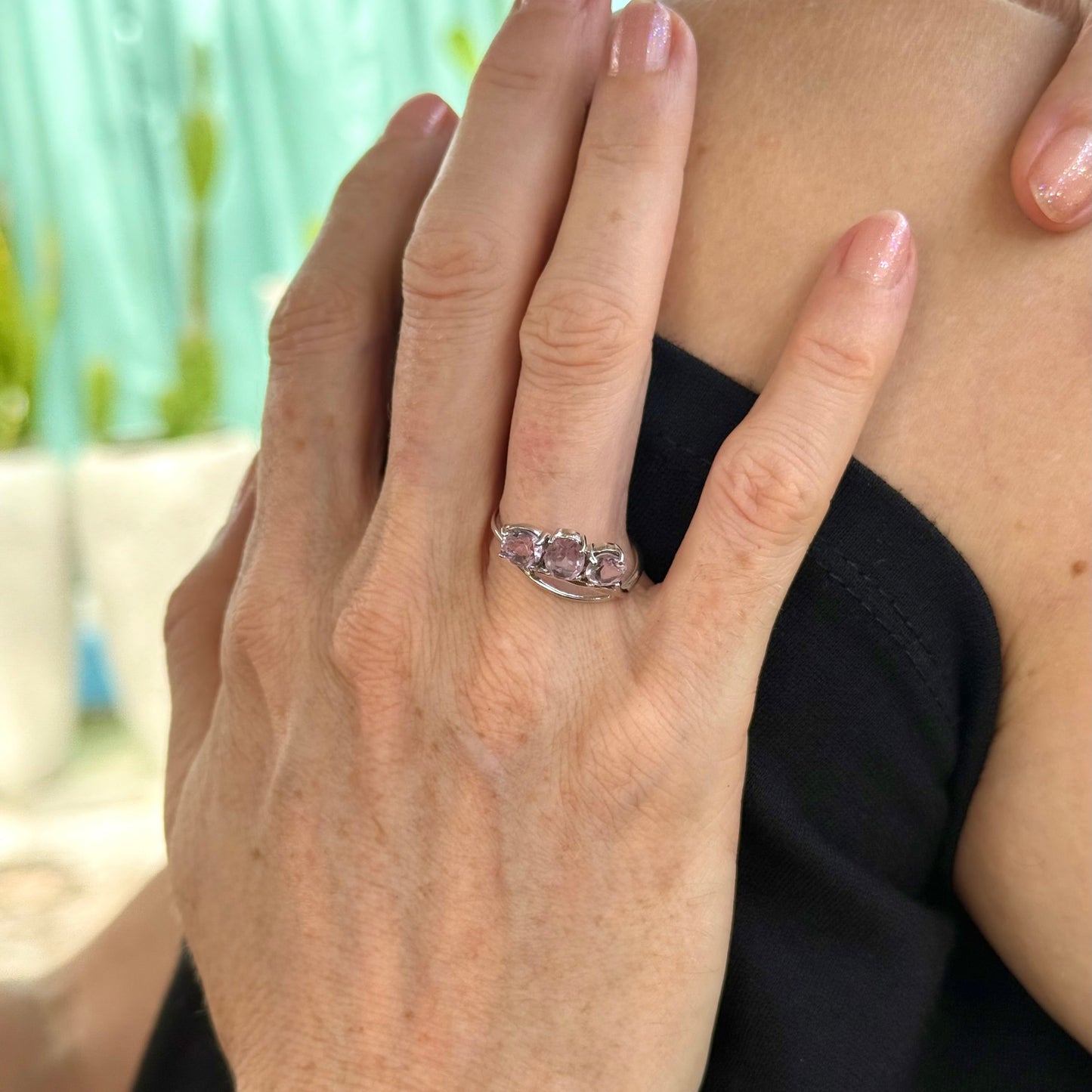 Three-stone amethyst ring in white gold plated sterling silver, featuring natural violet gemstones with soft lavender brilliance, elegant and feminine design.