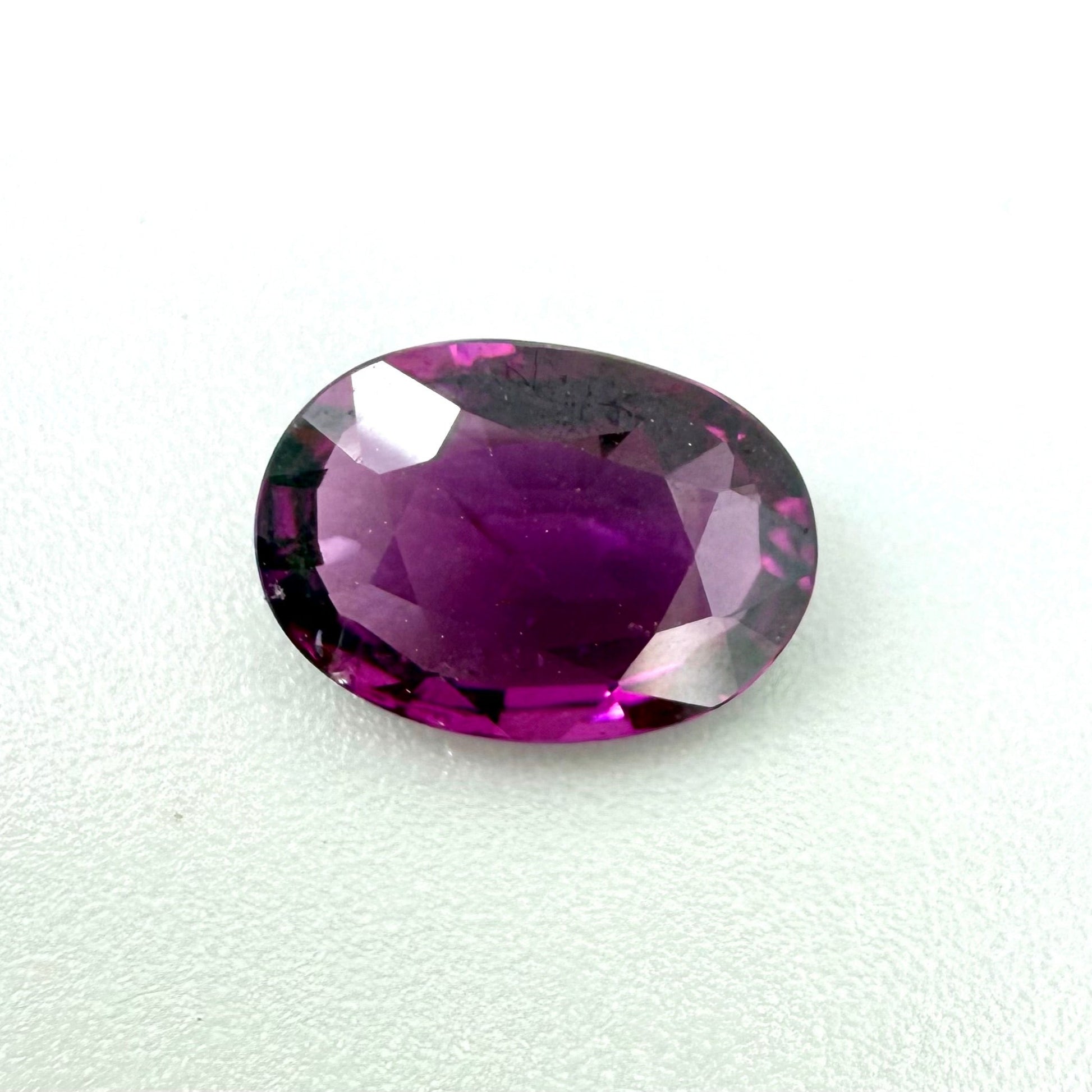 Natural Vibrant Purple Rhodolite gemstone, oval shape