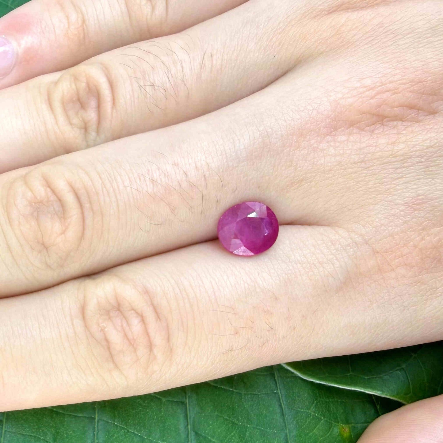 2.5 ct natural pink-red Mozambique ruby, oval cut.