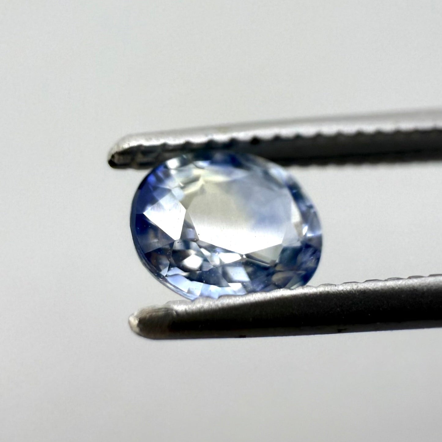 Bi-Color (Blue, White) Sapphire Oval 0.5 Ct