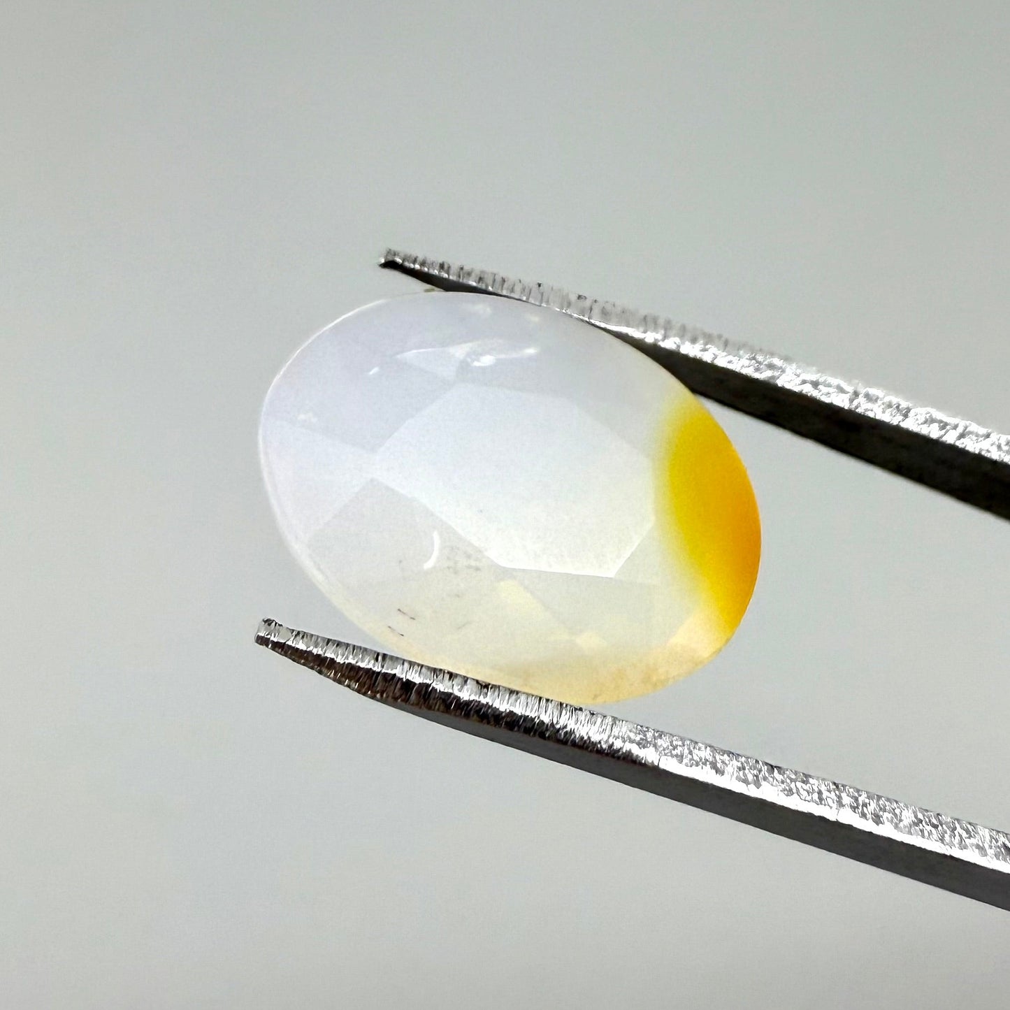Bi-Color (Milky White, Orange) Opal Oval 2.28 Ct
