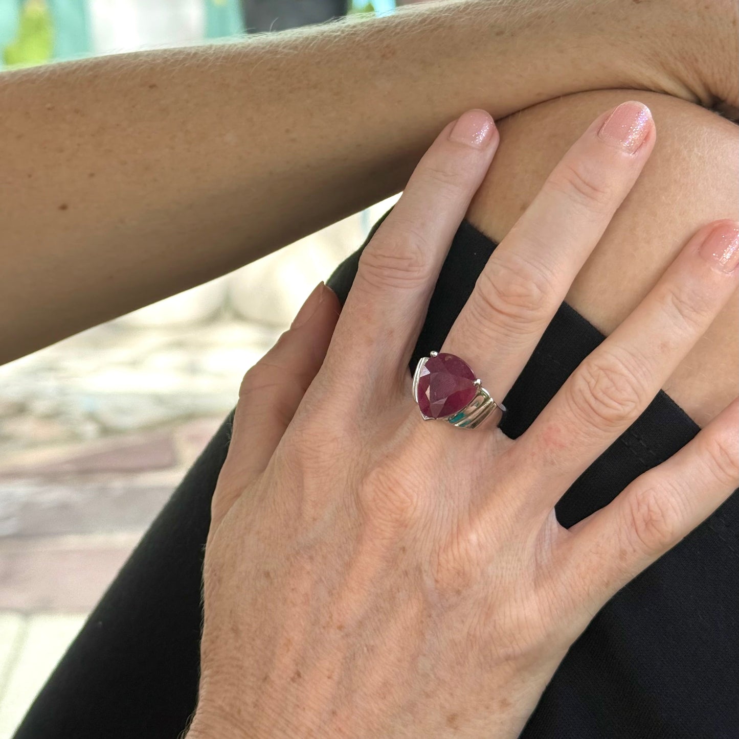 Ruby solitaire ring in white gold plated sterling silver, featuring a natural deep red gemstone, elegant and timeless design.