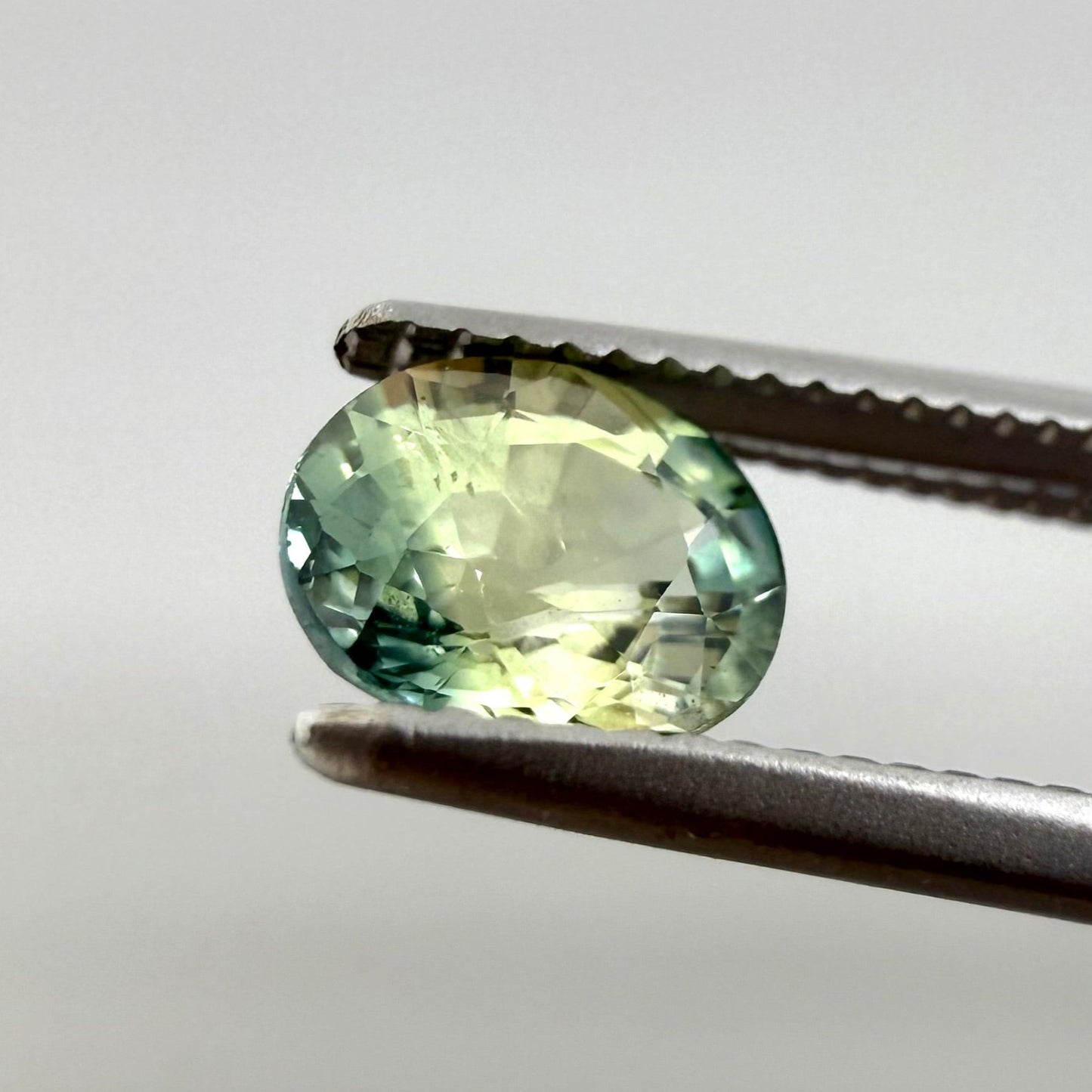 Bi-Color (Greenish-Blue Yellow) Sapphire Oval 0.78 Ct