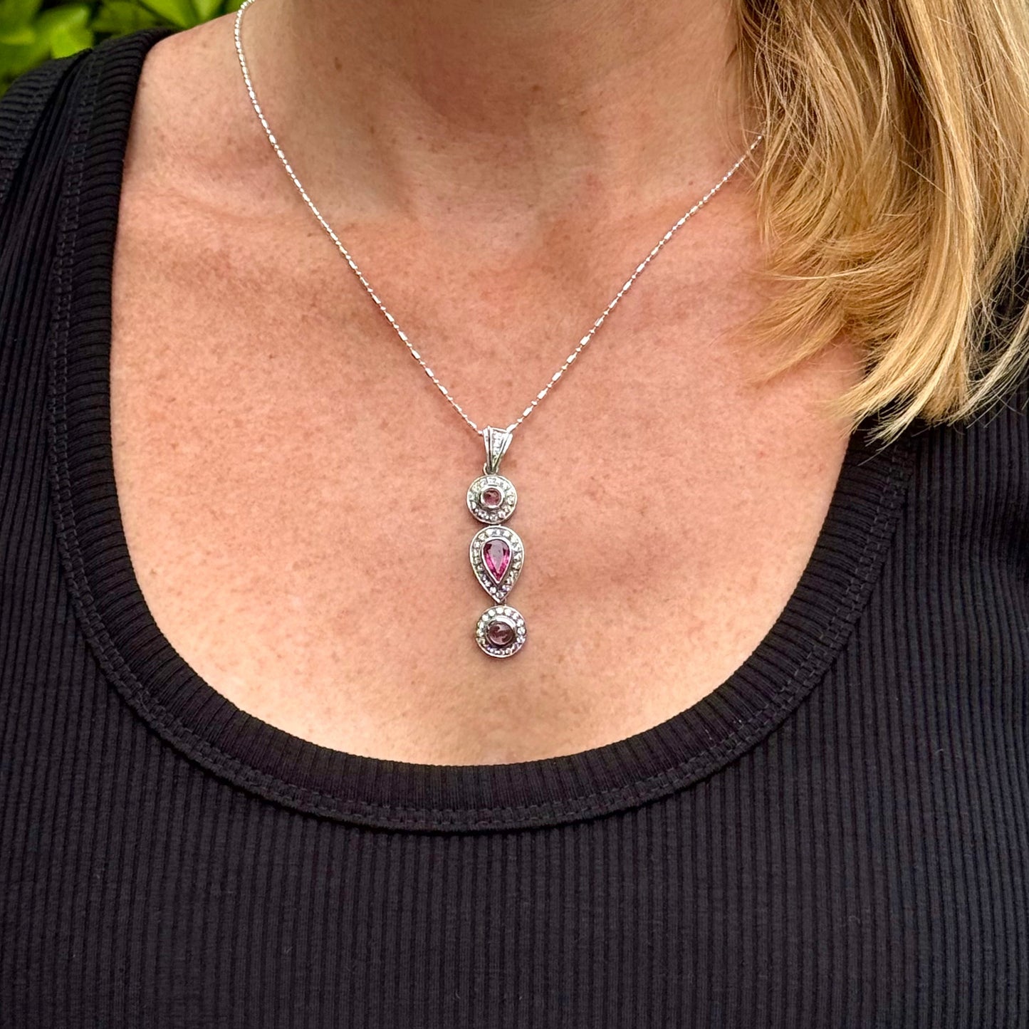 Handmade pendant featuring a 2.12 ct natural green tourmaline with cubic zirconia accents, set in white-gold-plated sterling silver.