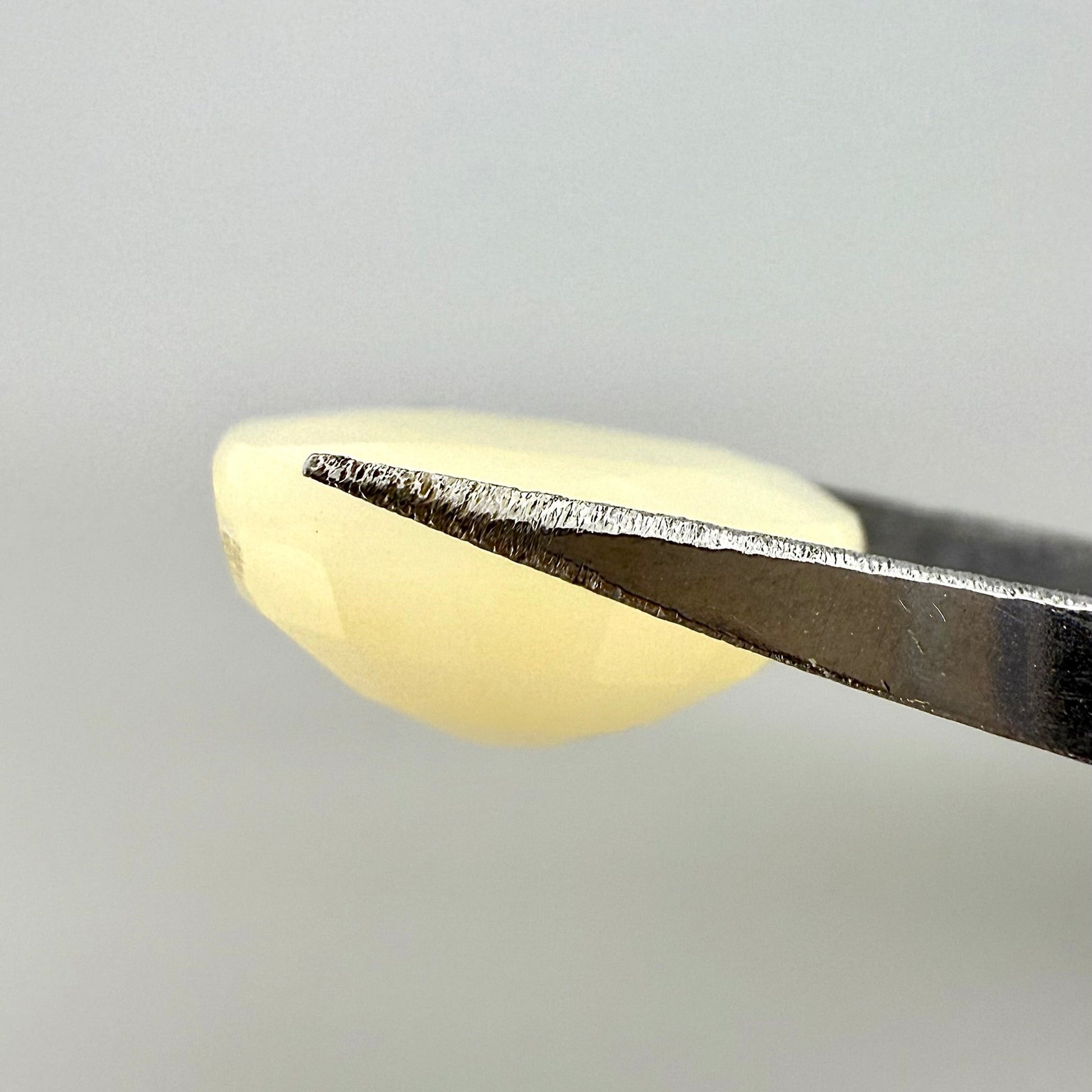Natural mother-of-pearl Opal gemstone, oval cut