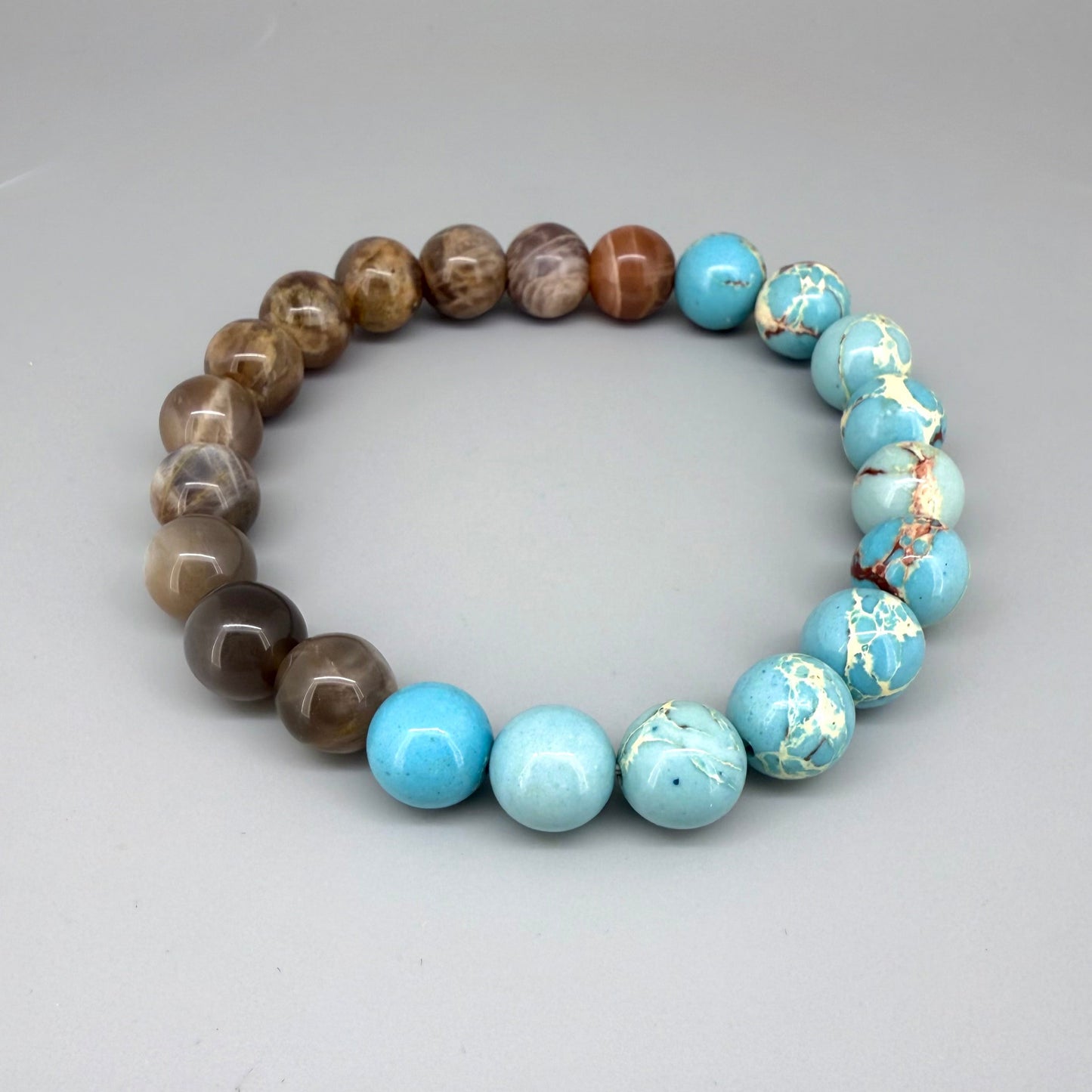 Varescite and moonstone beaded bracelet, 21cm, turquoise-green and brown gemstone beads with shimmering white moonstone on elastic stretch band.