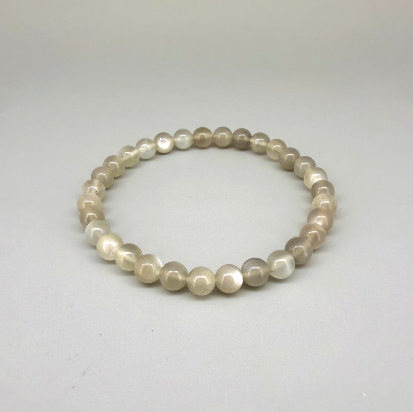 Moonstone beaded bracelet, 20cm, natural beige and earthy gemstone beads with subtle shimmer on elastic stretch band.
