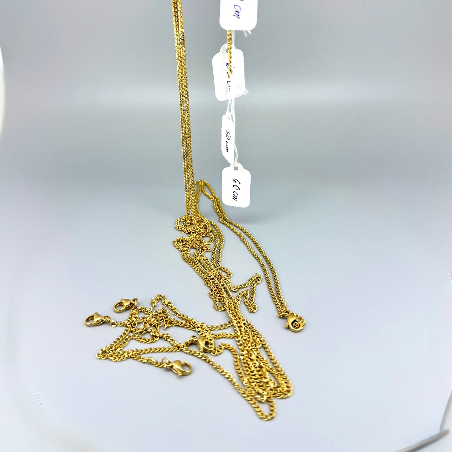 60cm gold tone stainless steel chain, polished finish, elegant and durable, perfect for pendants or layering.