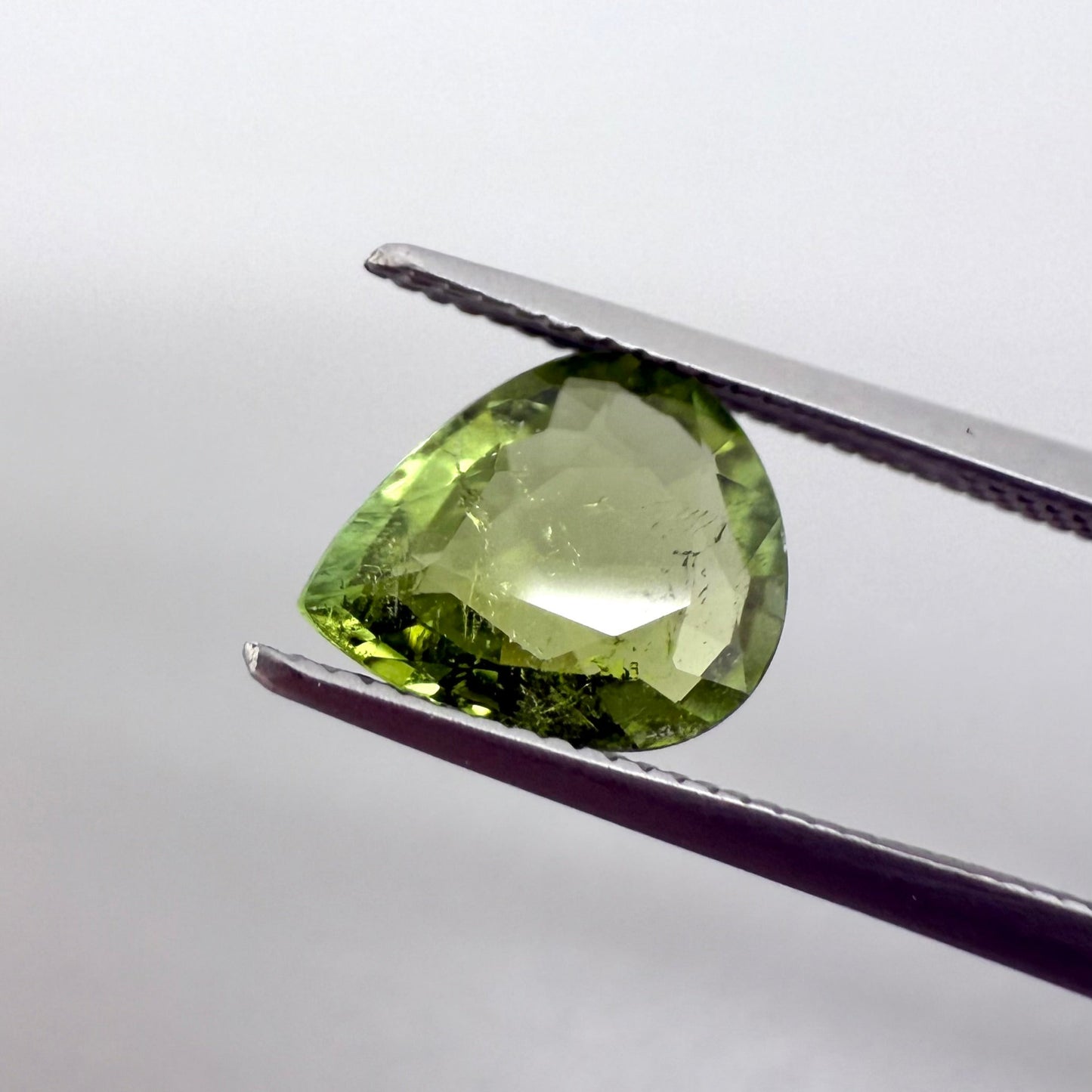 Natural Yellowish Green Tourmaline gemstone, pear cut