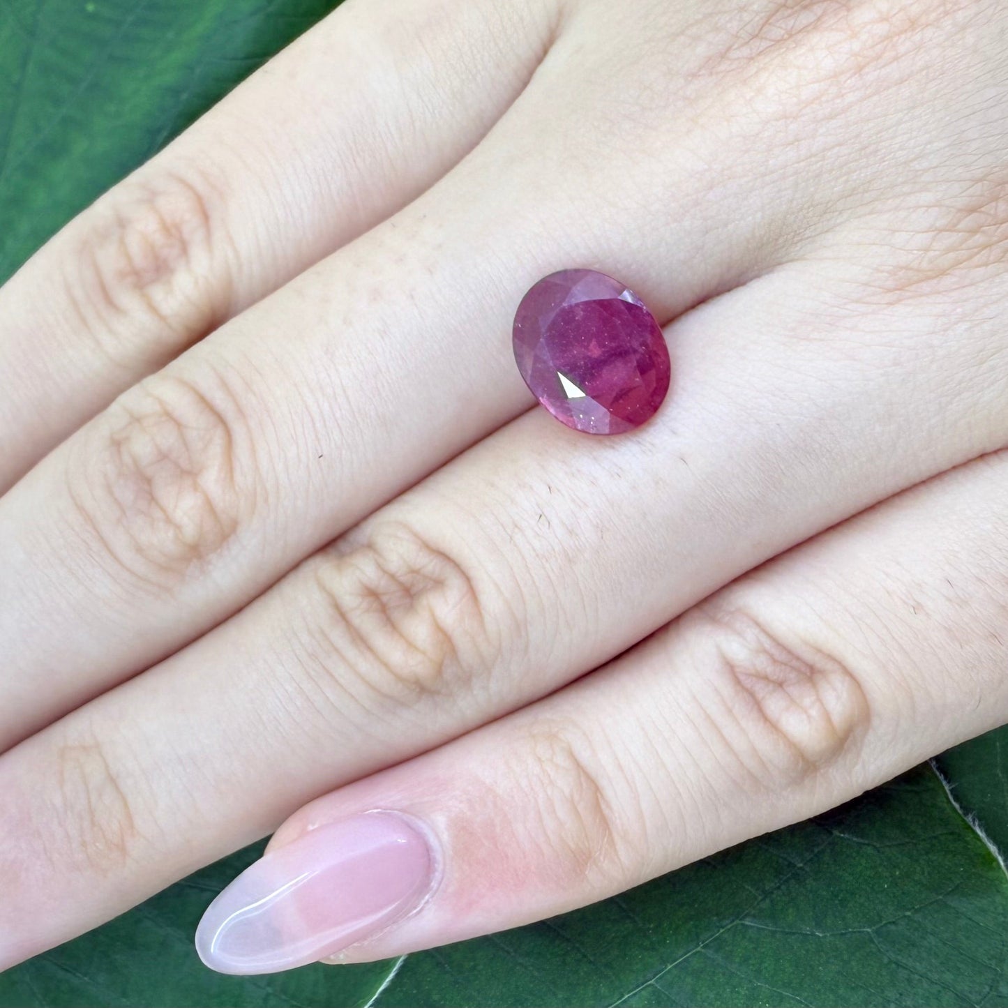 Natural Purplish Red Ruby gemstone, oval cut