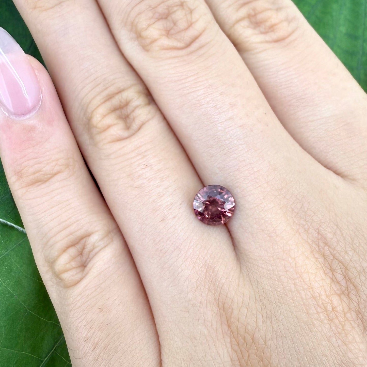 Loose Peach-Pink Zircon gemstone, round