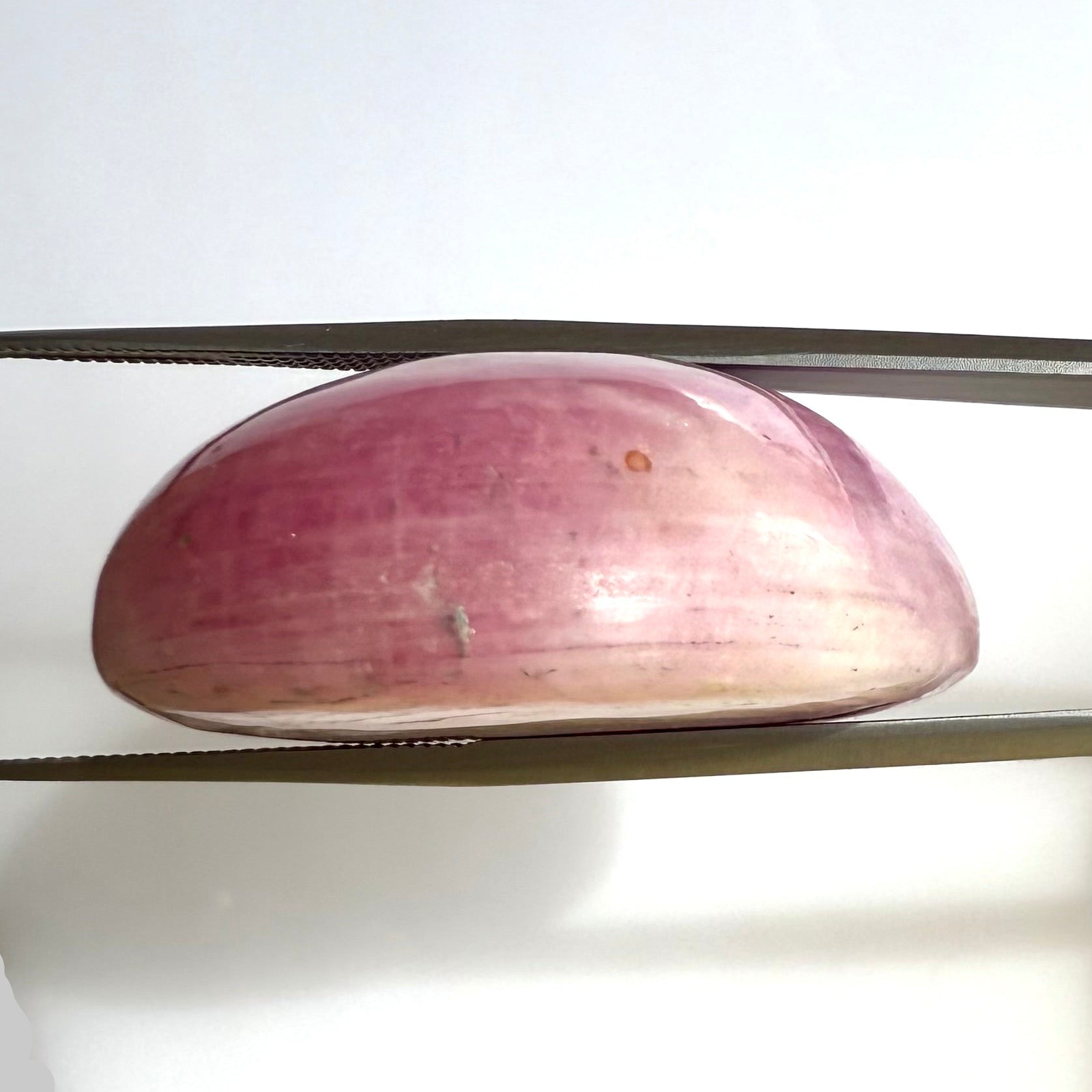 Natural pink purple hues Ruby cabochon gemstone