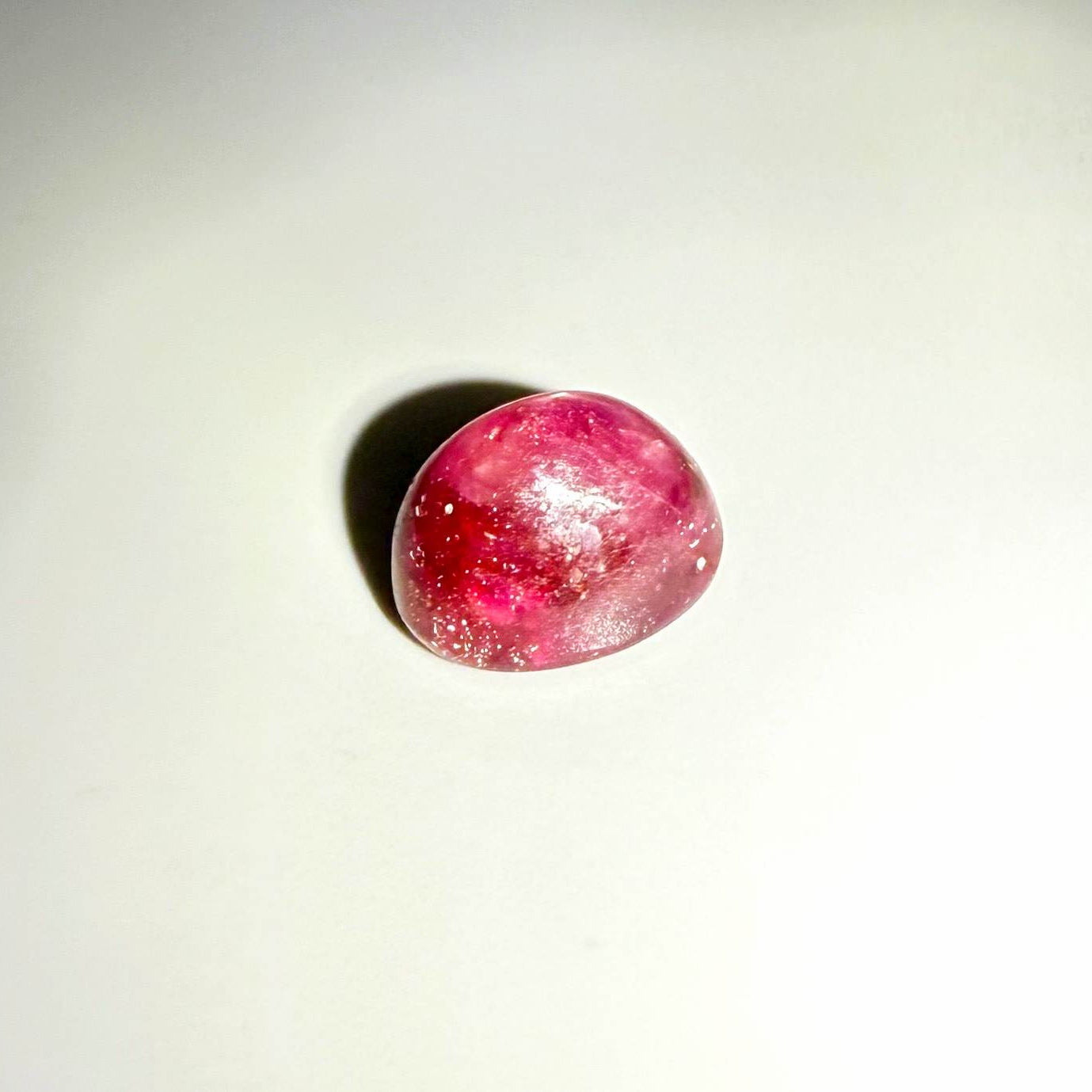 36.1 ct natural Pink-Red Star Ruby cabochon from Mozambique with soft star effect and polished dome.