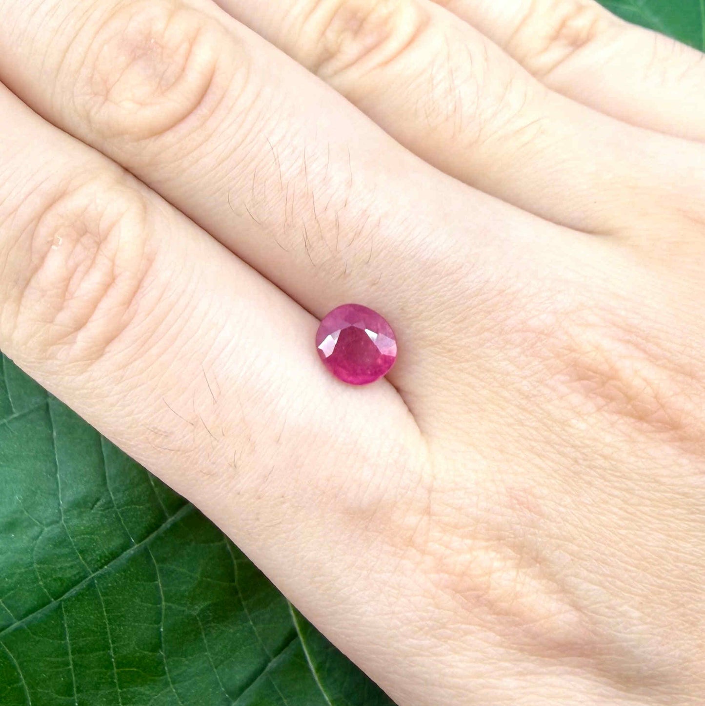 2 ct natural pink-red ruby from Mozambique, oval cut.