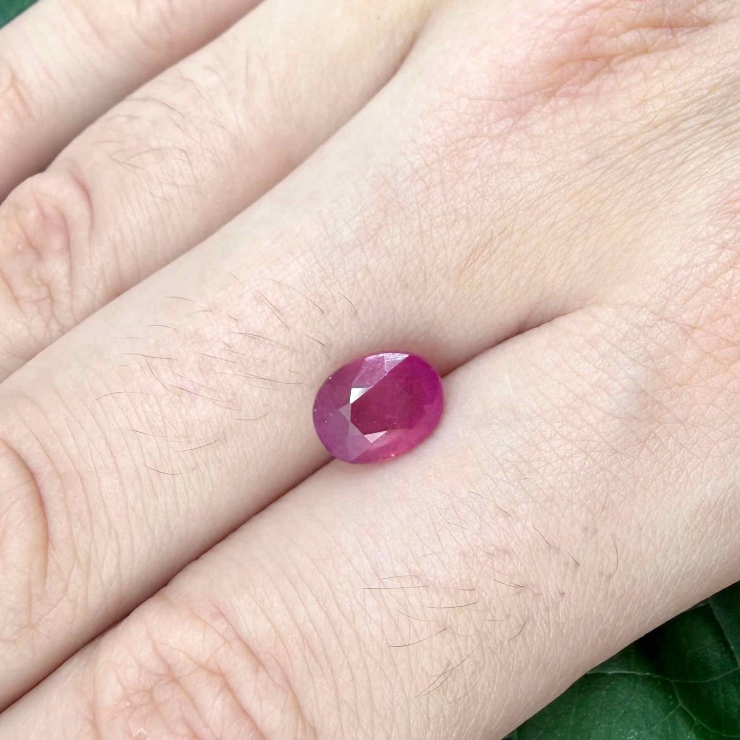 2.2 ct natural pink-red Mozambique ruby, oval cut.