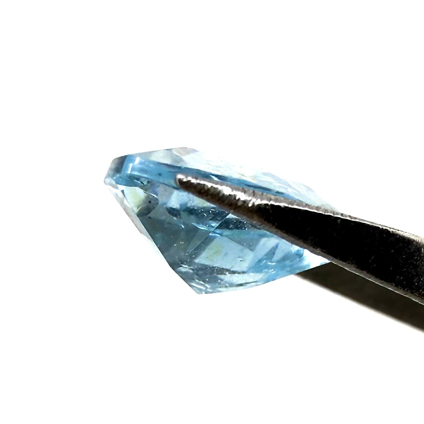 Bi-Color (White, Swiss Blue Inclusions) Topaz Trillion 3.54 Ct