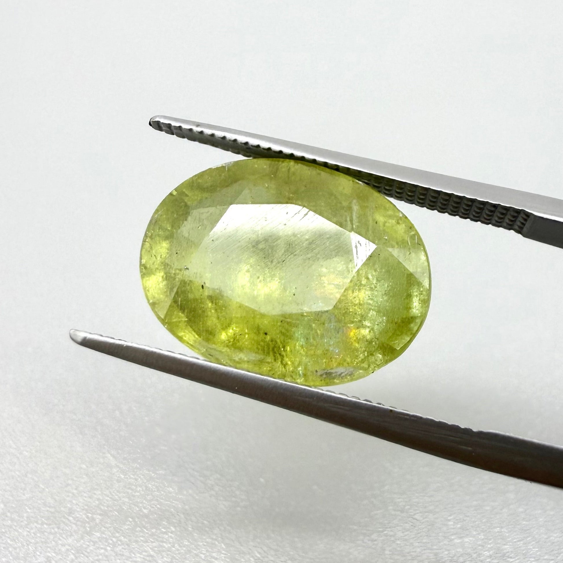 Natural Green Yellow Sphene gemstone, oval cut