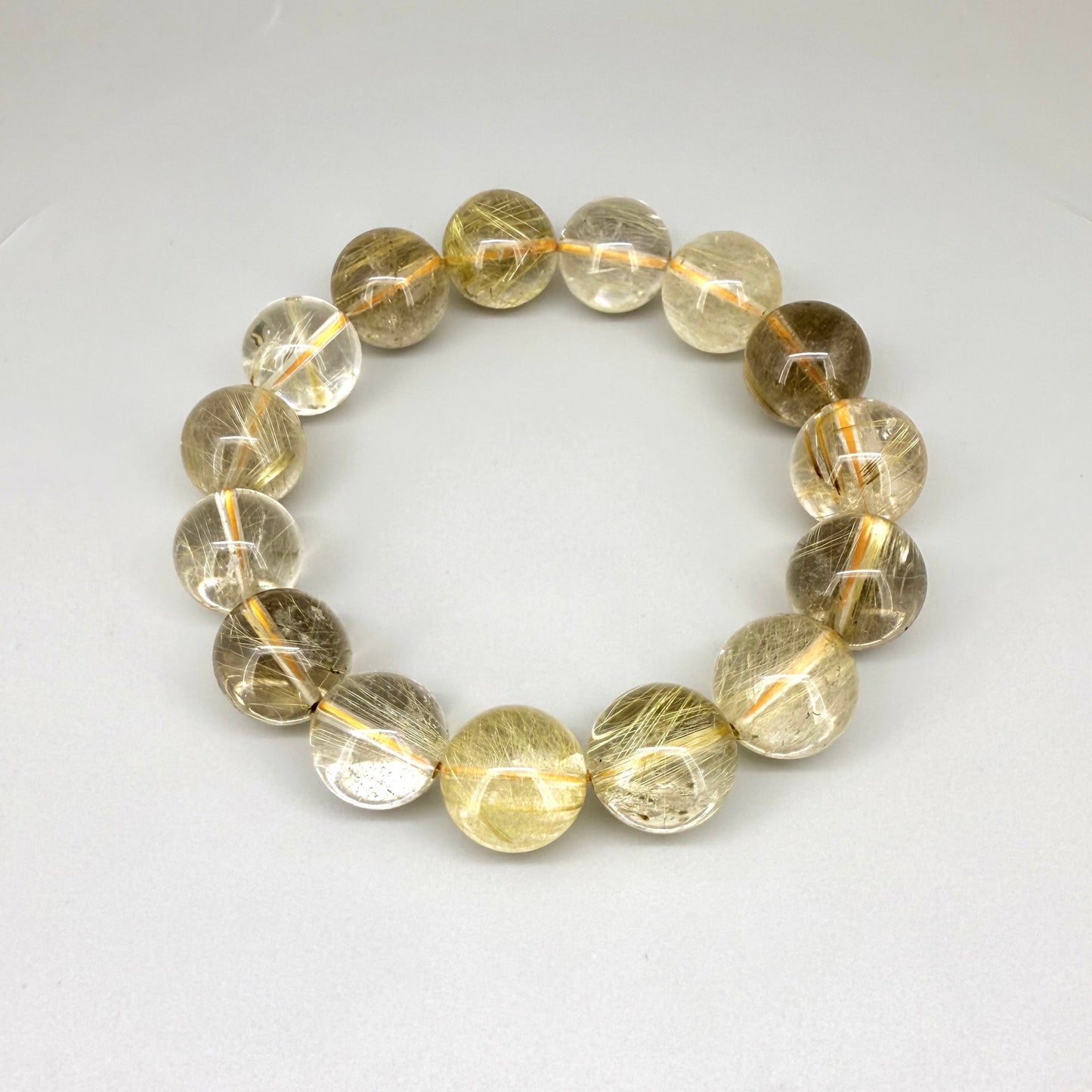 Rutilated quartz beaded bracelet, 18cm, natural gemstone beads with golden rutile threads on elastic stretch band