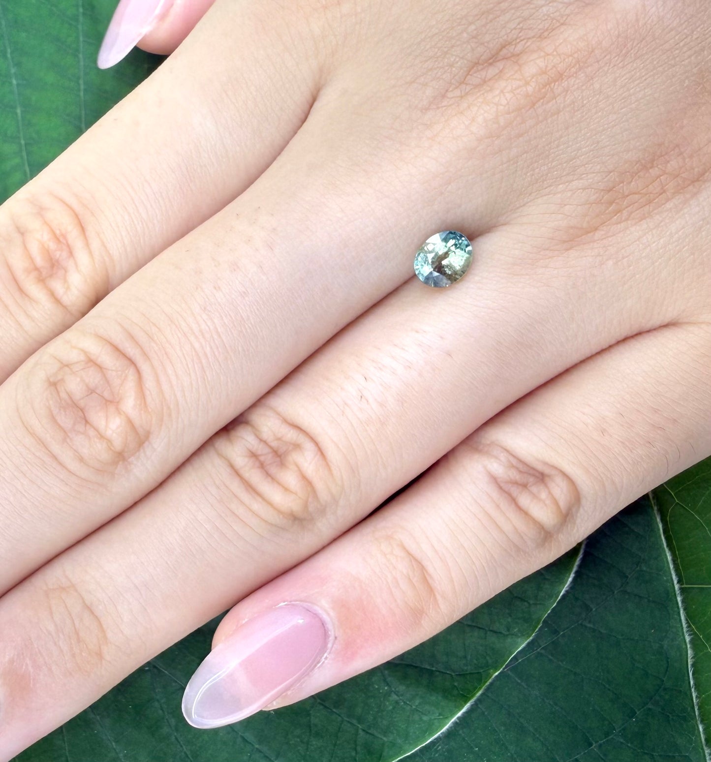 Bi-Color (Greenish-Blue Yellow) Sapphire Oval 0.78 Ct