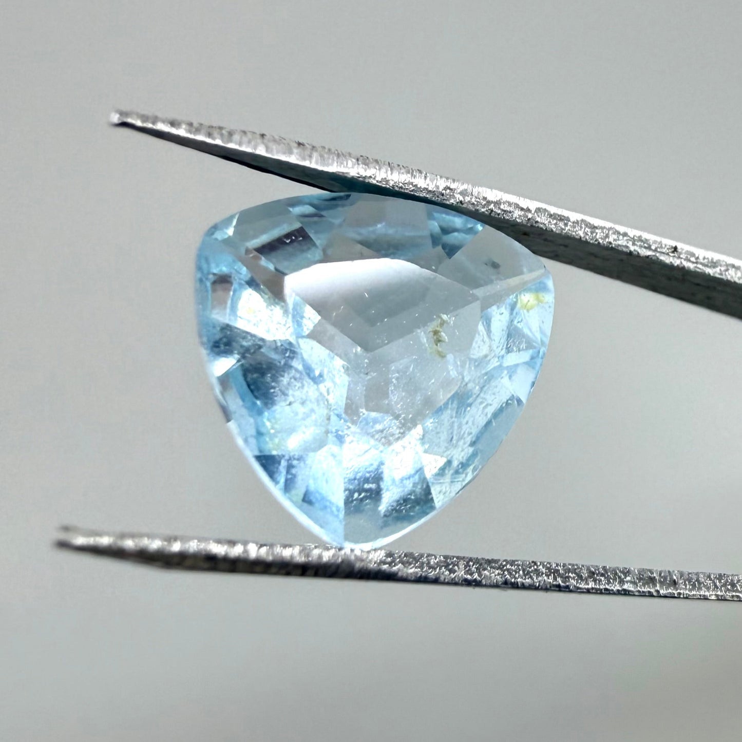 Bi-Color (White, Swiss Blue Inclusions) Topaz Trillion 3.54 Ct