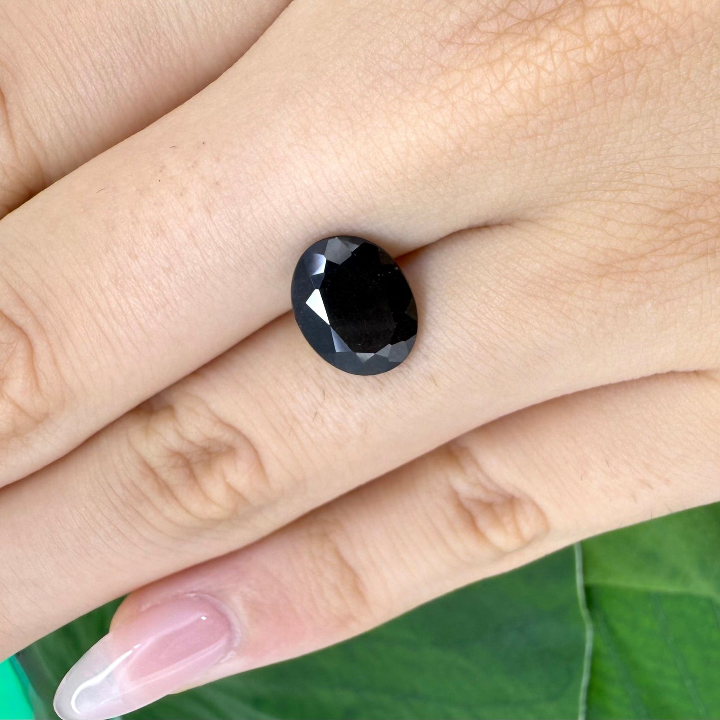 Natural Black Violet Scapolite gemstone, oval cut