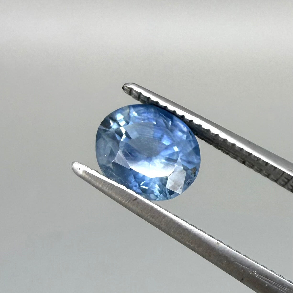 1.63 ct natural sky-blue sapphire from Thailand, oval cut.