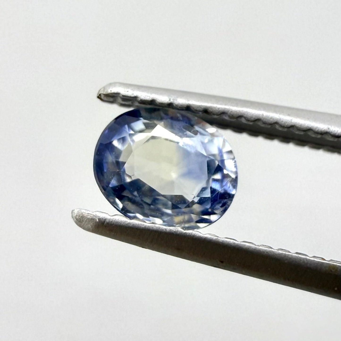 Bi-Color (Blue, White) Sapphire Oval 0.5 Ct