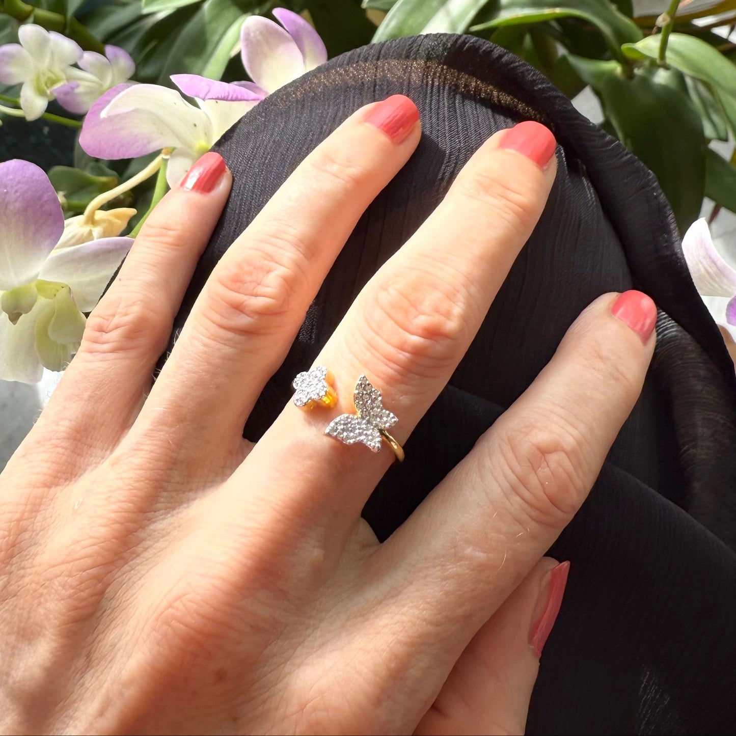 23k gold butterfly and flower ring with 47 cubic zirconia in open design, size 57.