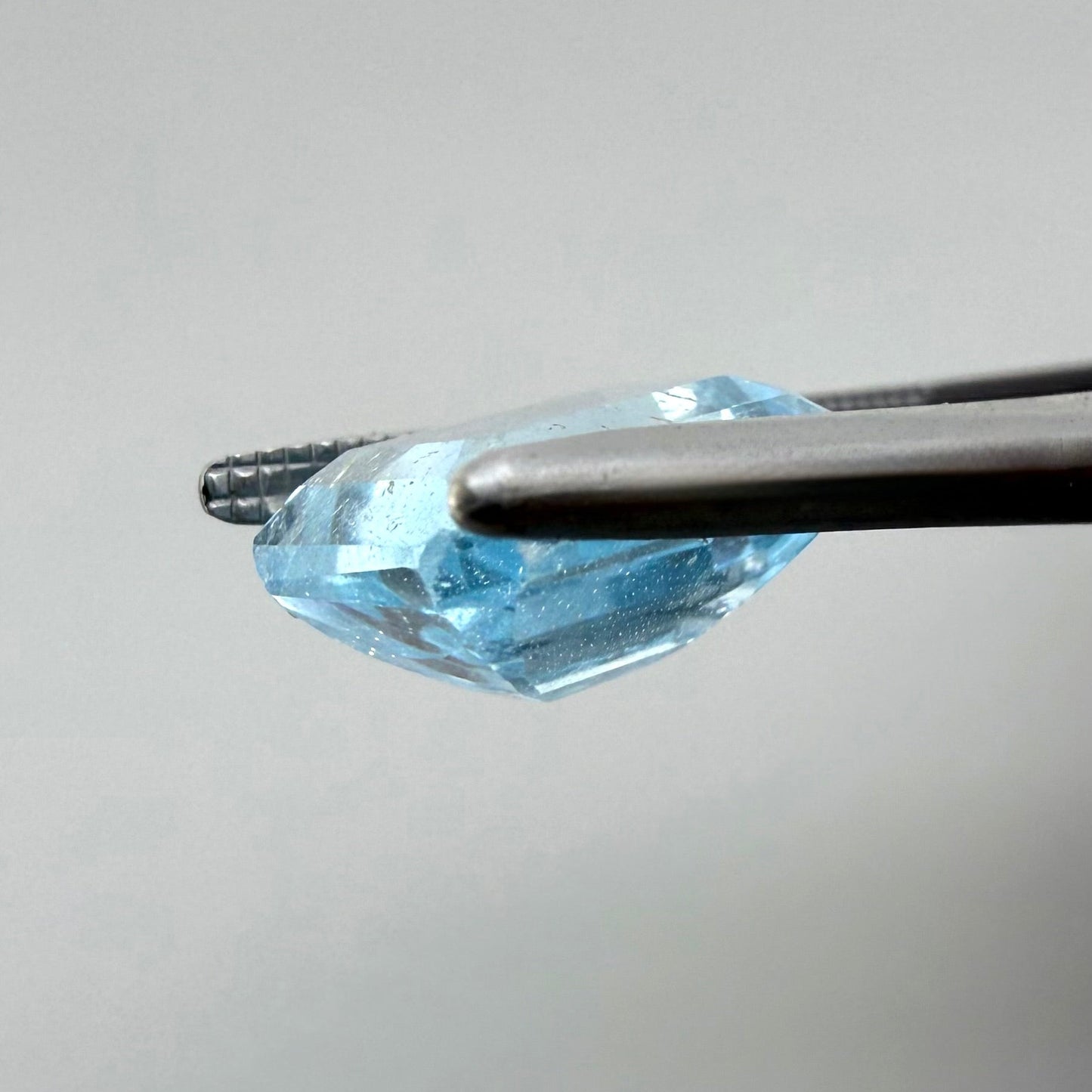Swiss Blue Topaz with Gold Inclusions Emerald Cut 4.55 Ct
