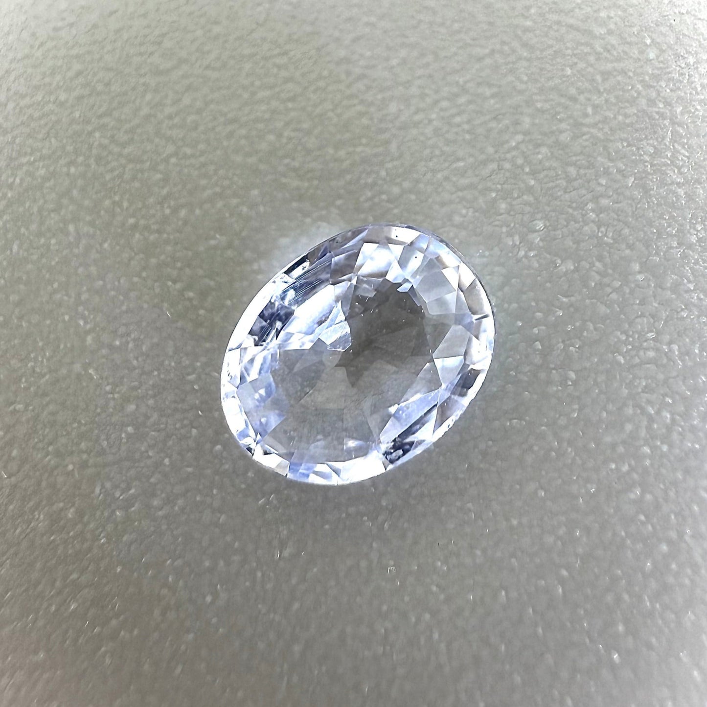 Bi-Color (White Pale Blue) Sapphire Oval 0.62 Ct