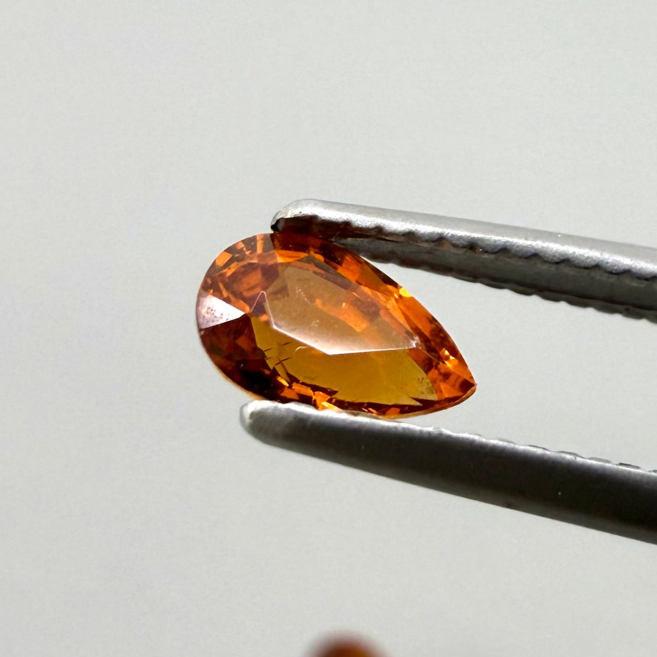 Fiery Orange Spessartine Set Pear 0.89 Ct