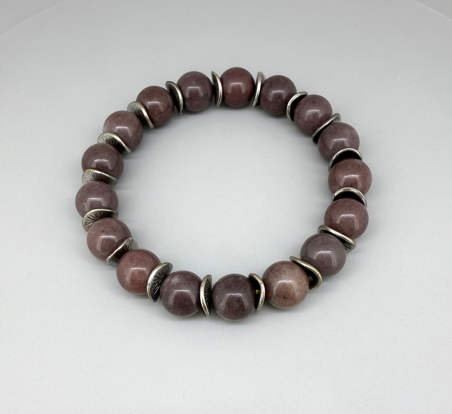 Aventurine beaded bracelet, 18cm, deep earth tones gemstone beads with curved metal disc spacers on elastic stretch band.