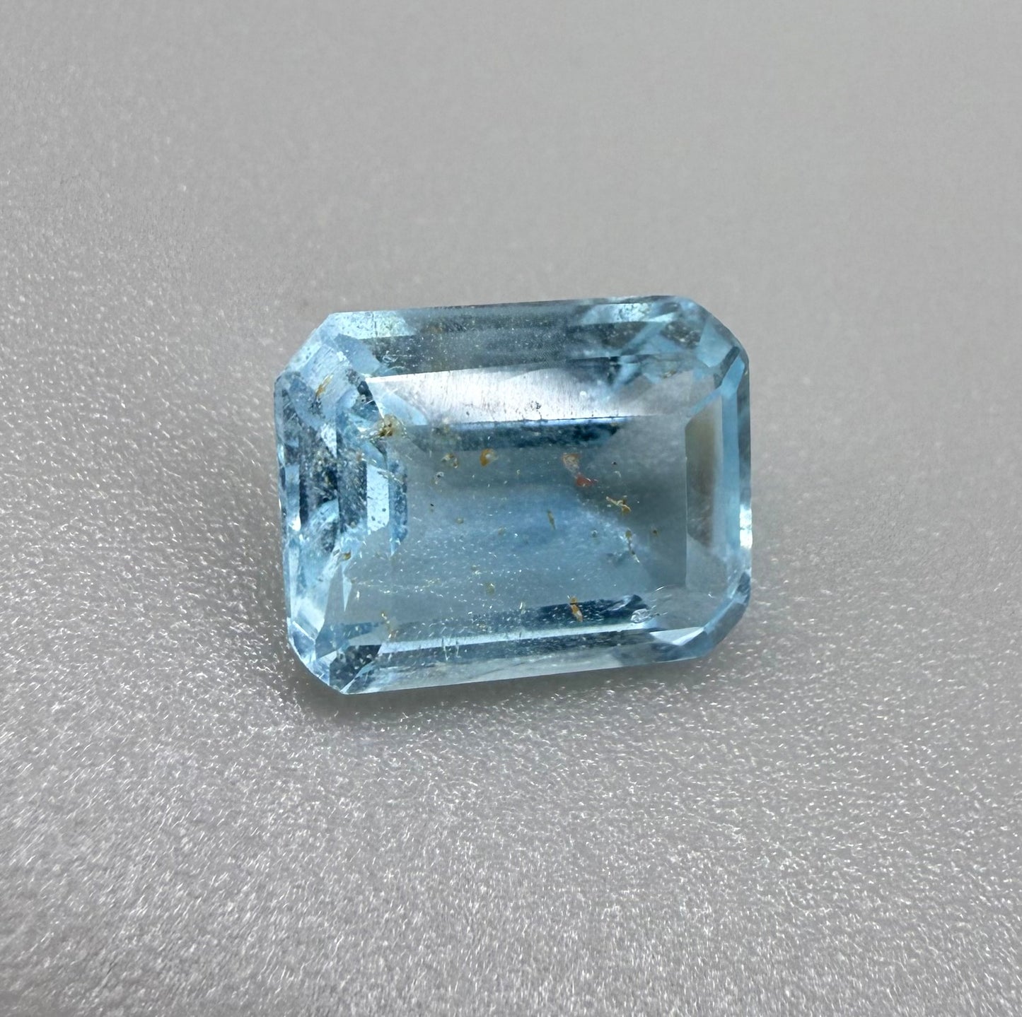 Swiss Blue Topaz with Gold Inclusions Emerald Cut 4.55 Ct