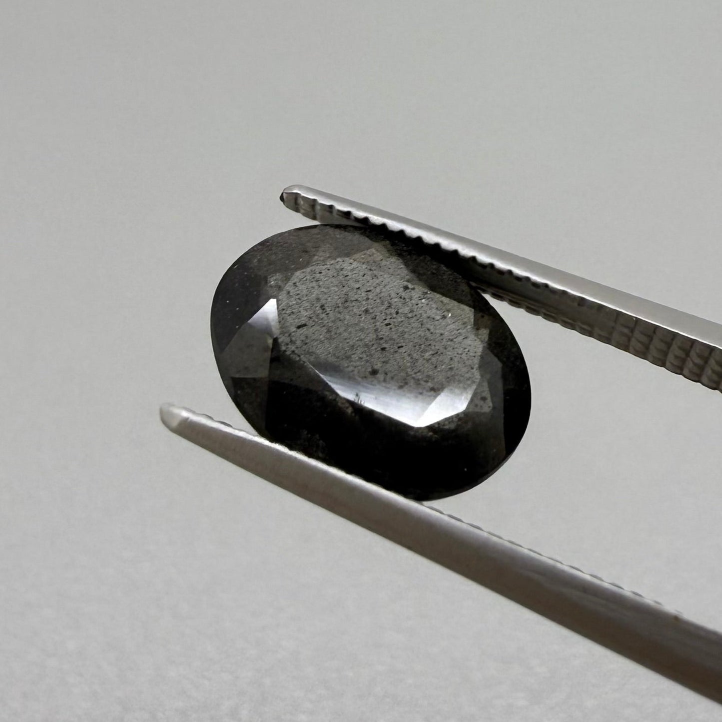 Black-Anthracite/Dark-Violet Scapolite Oval 2.45 Ct
