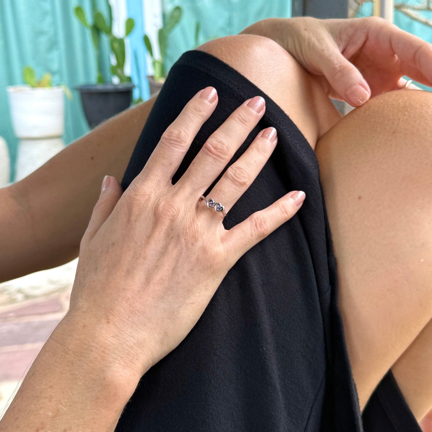 Delicate sapphire ring in white gold plated sterling silver, featuring natural blue gemstones in a graceful setting, elegant and timeless design.