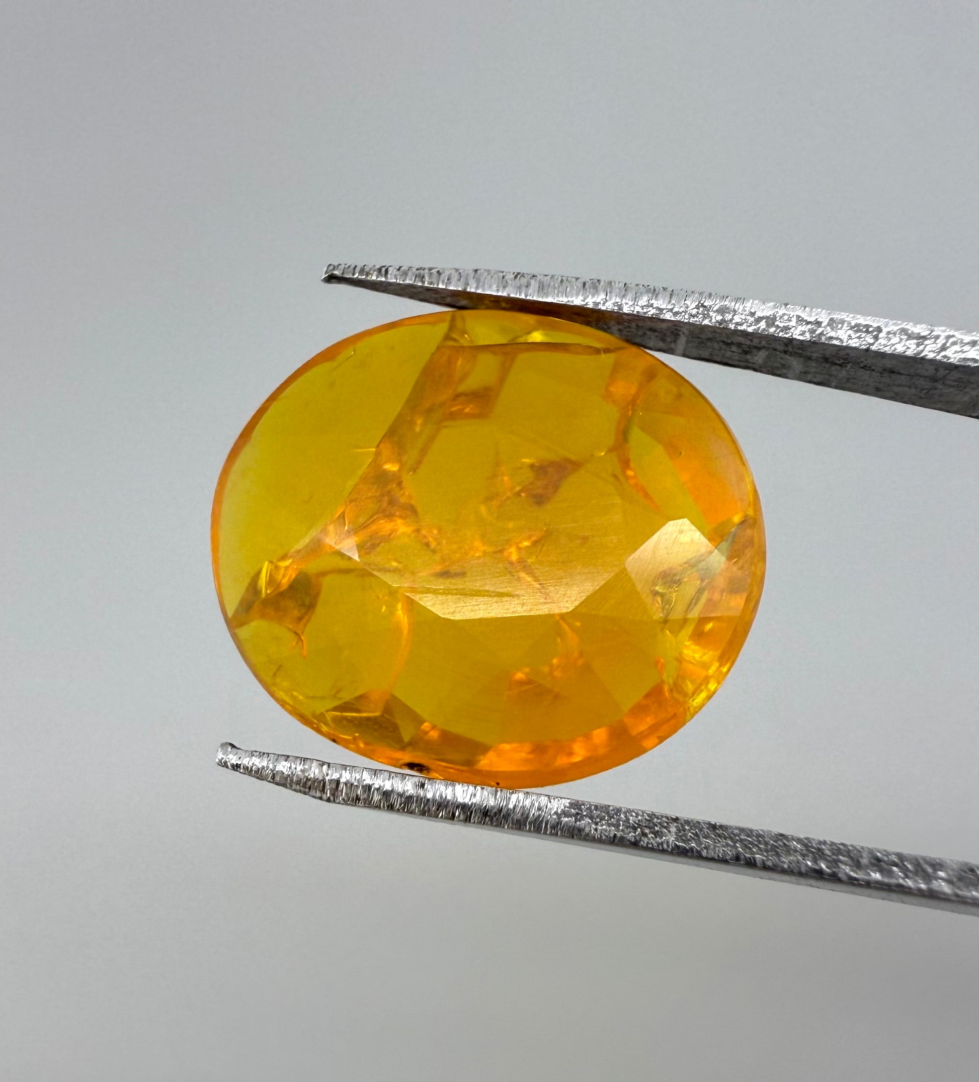 Natural Orange Fire Opal gemstone, oval shape