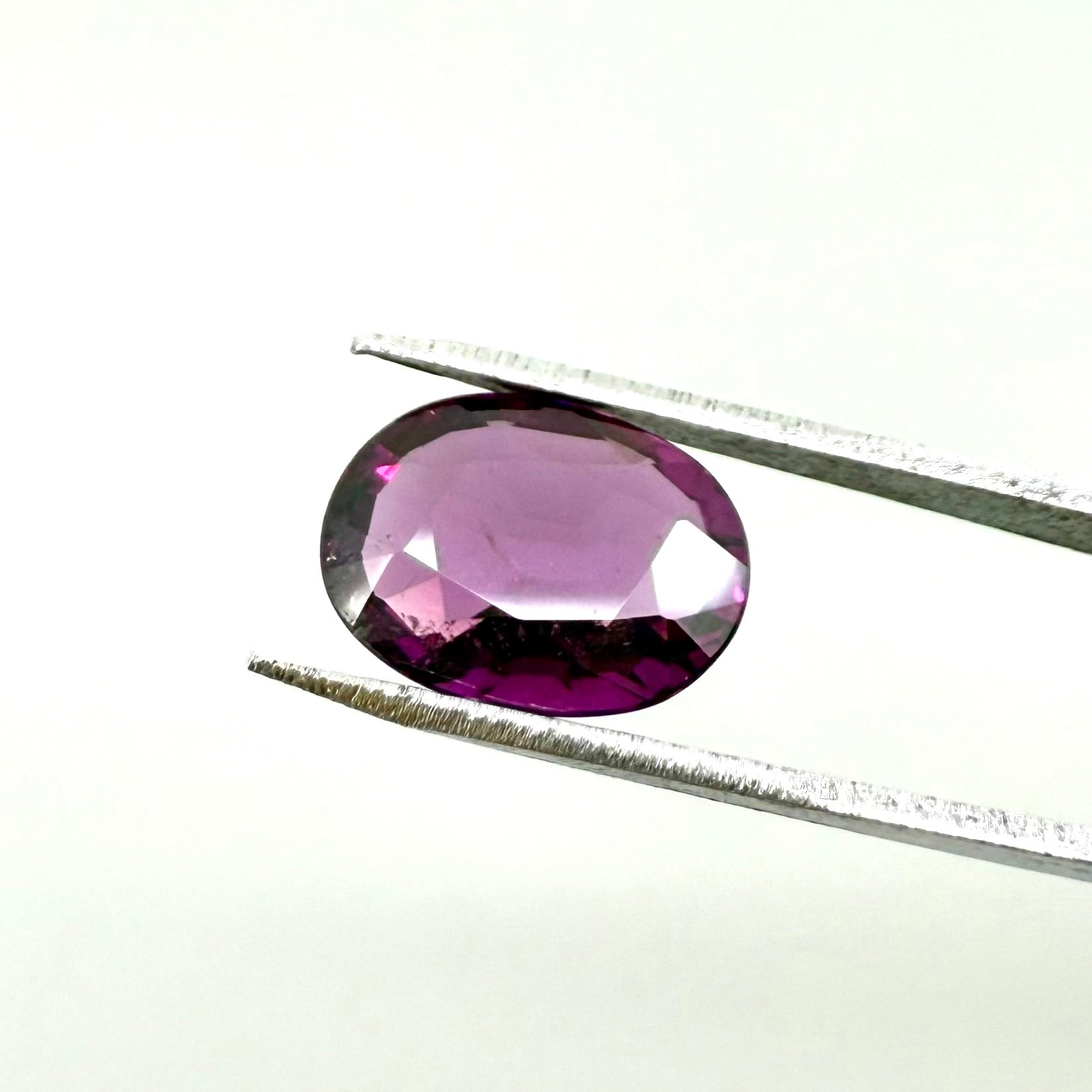 Natural Vibrant Purple Rhodolite gemstone, oval shape