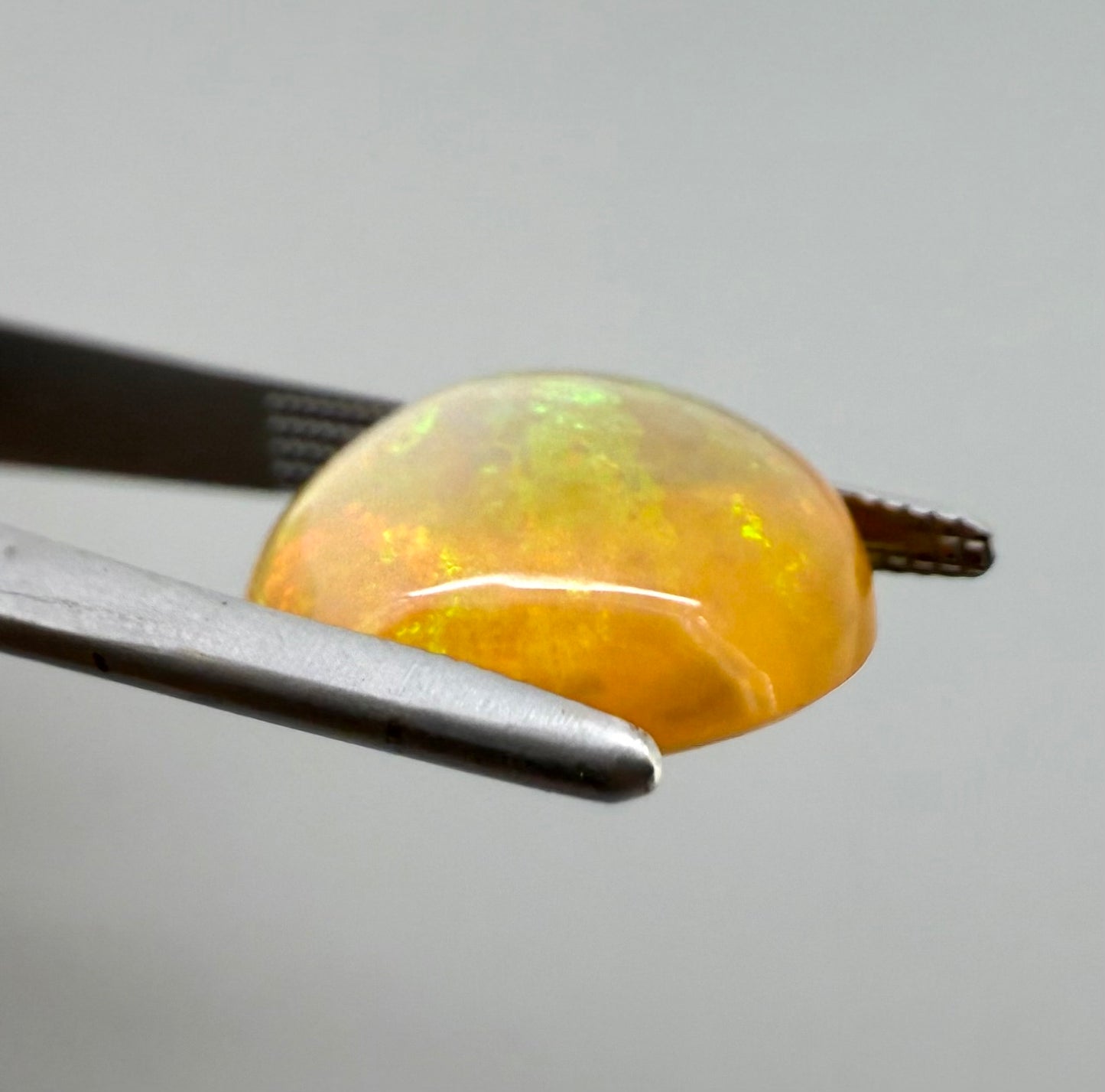 Multi-Color (Orange, Green, Yellow) ‘Play-of-Color’ Opal Cabochon 4.76 Ct