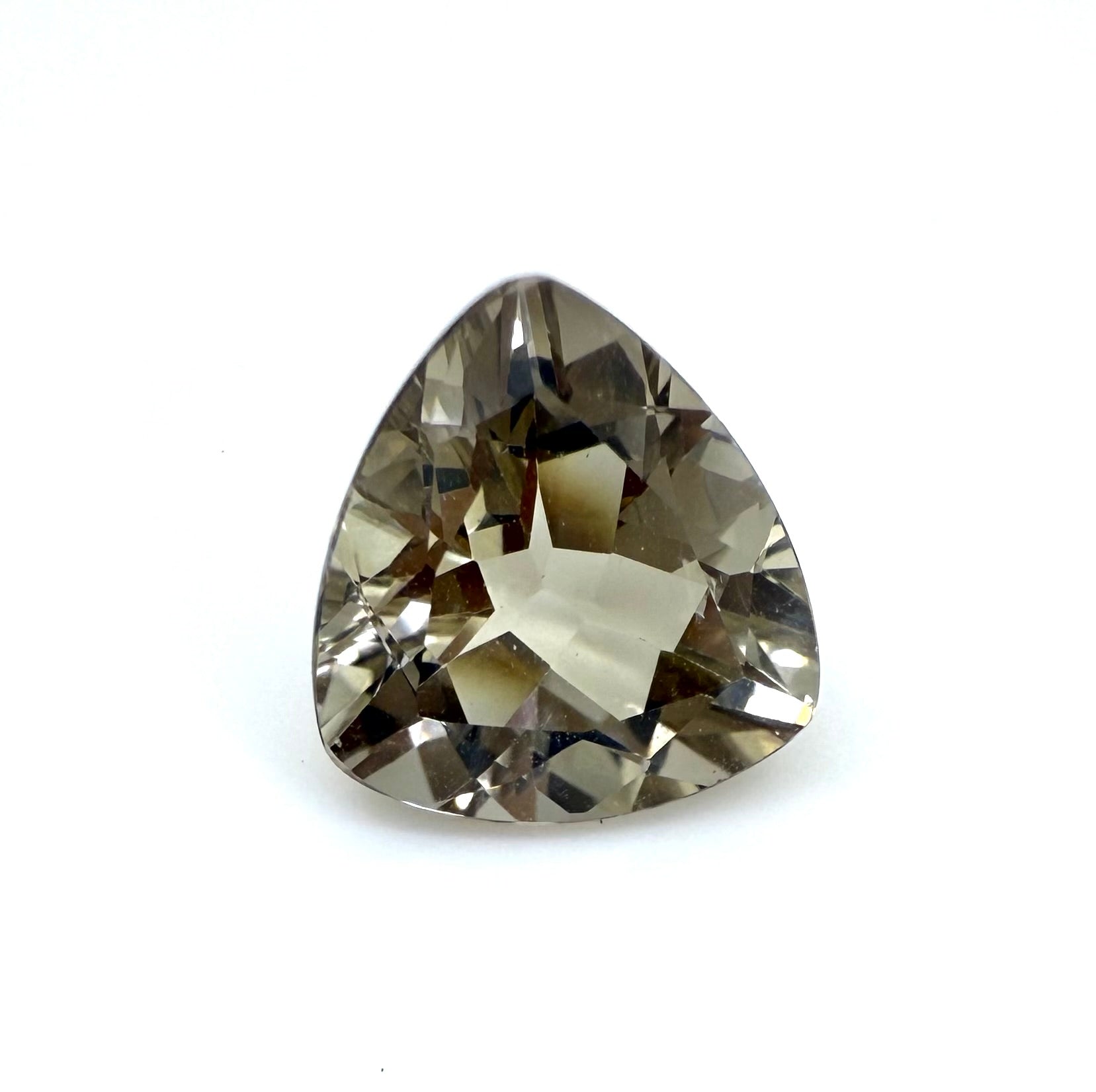Loose Champagne Topaz gemstone, trillion cut