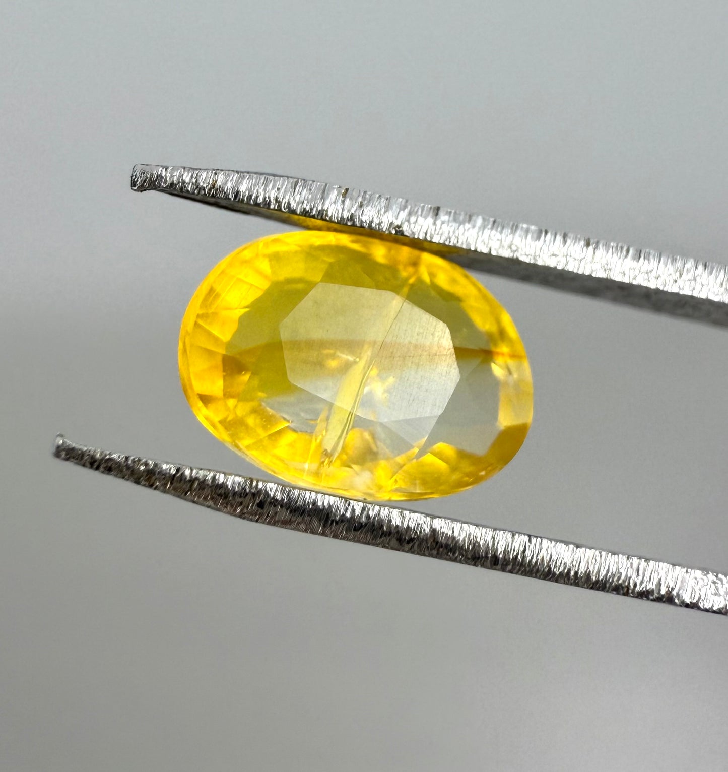 Bi-Color (White, Yellow-Orange) Fire Opal Oval 0.8 Ct