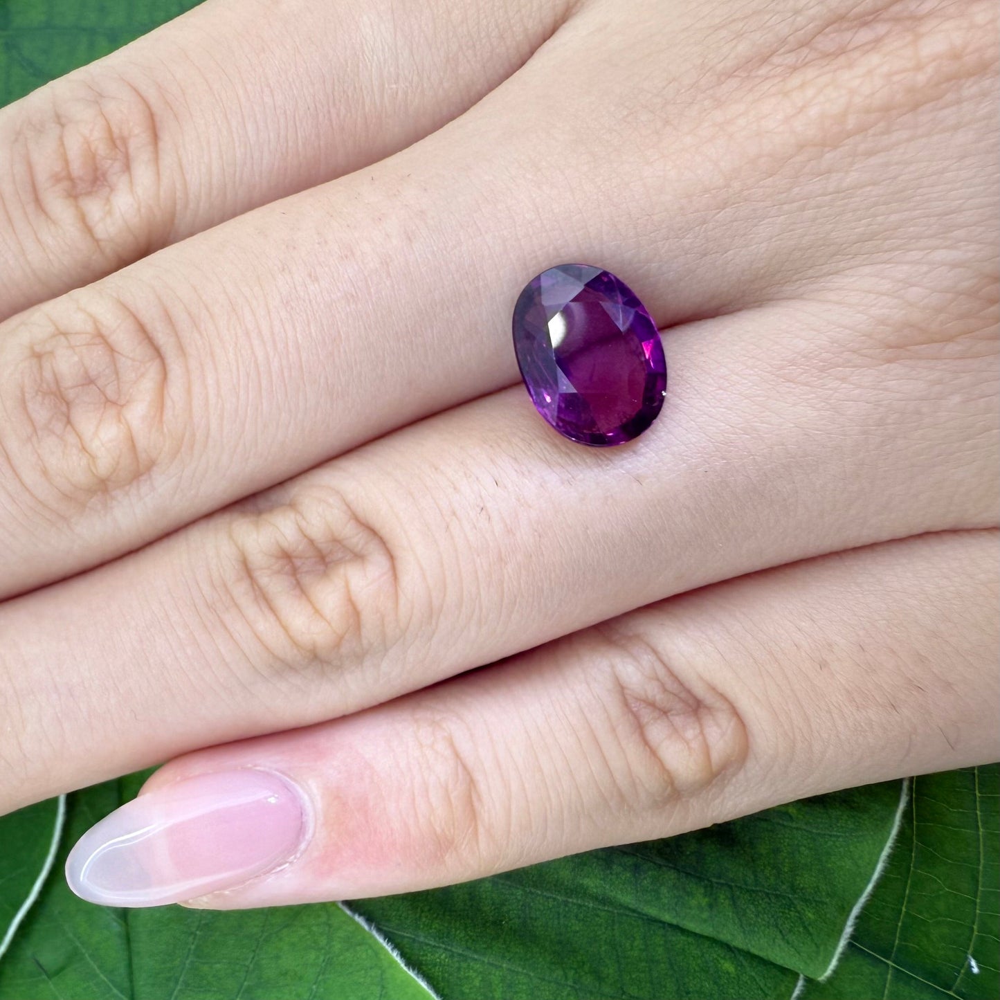 Natural Vibrant Purple Rhodolite gemstone, oval shape