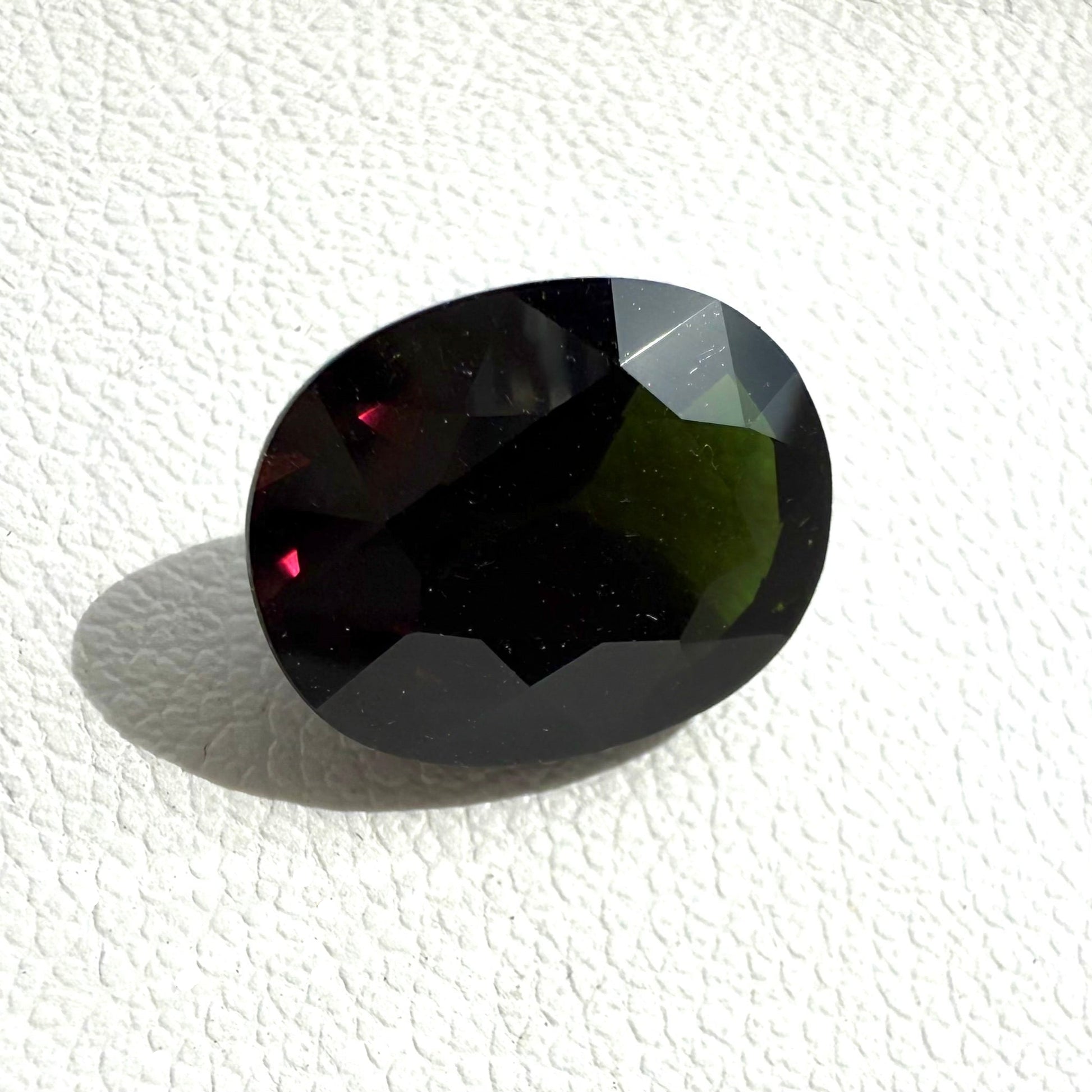 Natural color change Garnet gemstone, oval cut