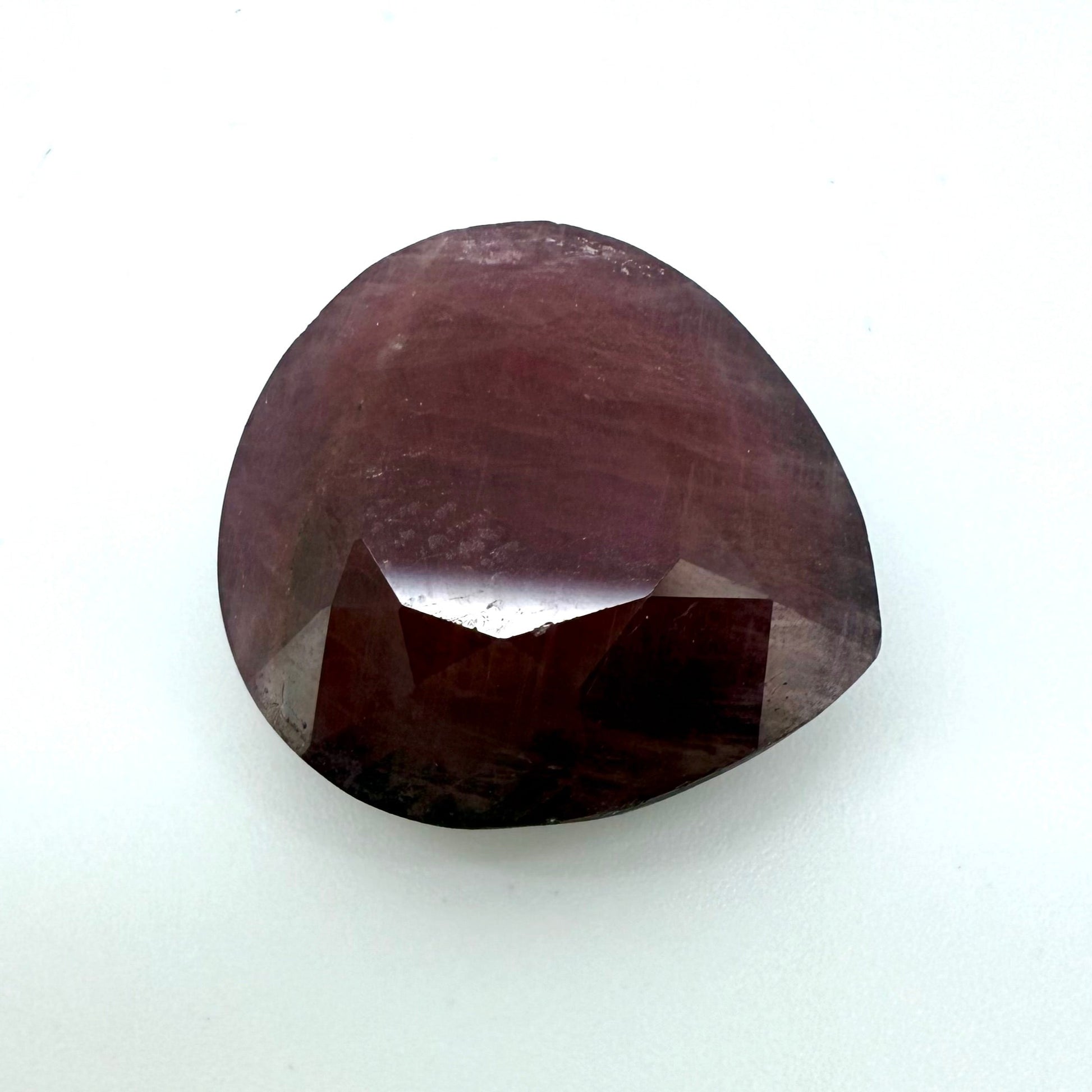 Natural Rusty Red Ruby gemstone, pear cut