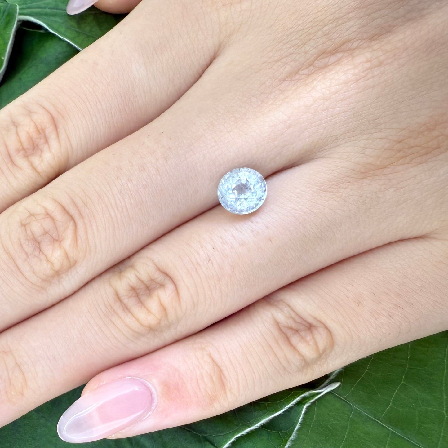 Natural Pale Blue Aquamarine gemstone, salt-and-pepper optic, round cut