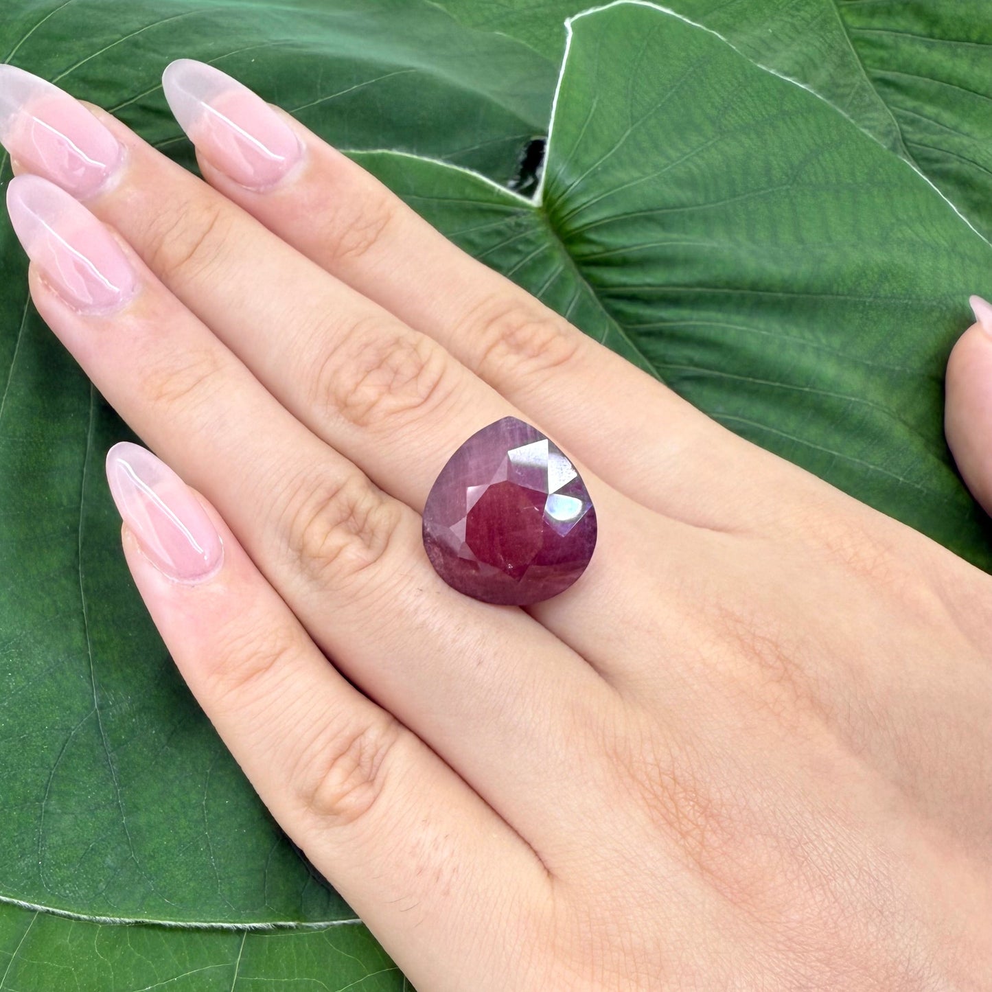 Natural Rusty Red Ruby gemstone, pear cut
