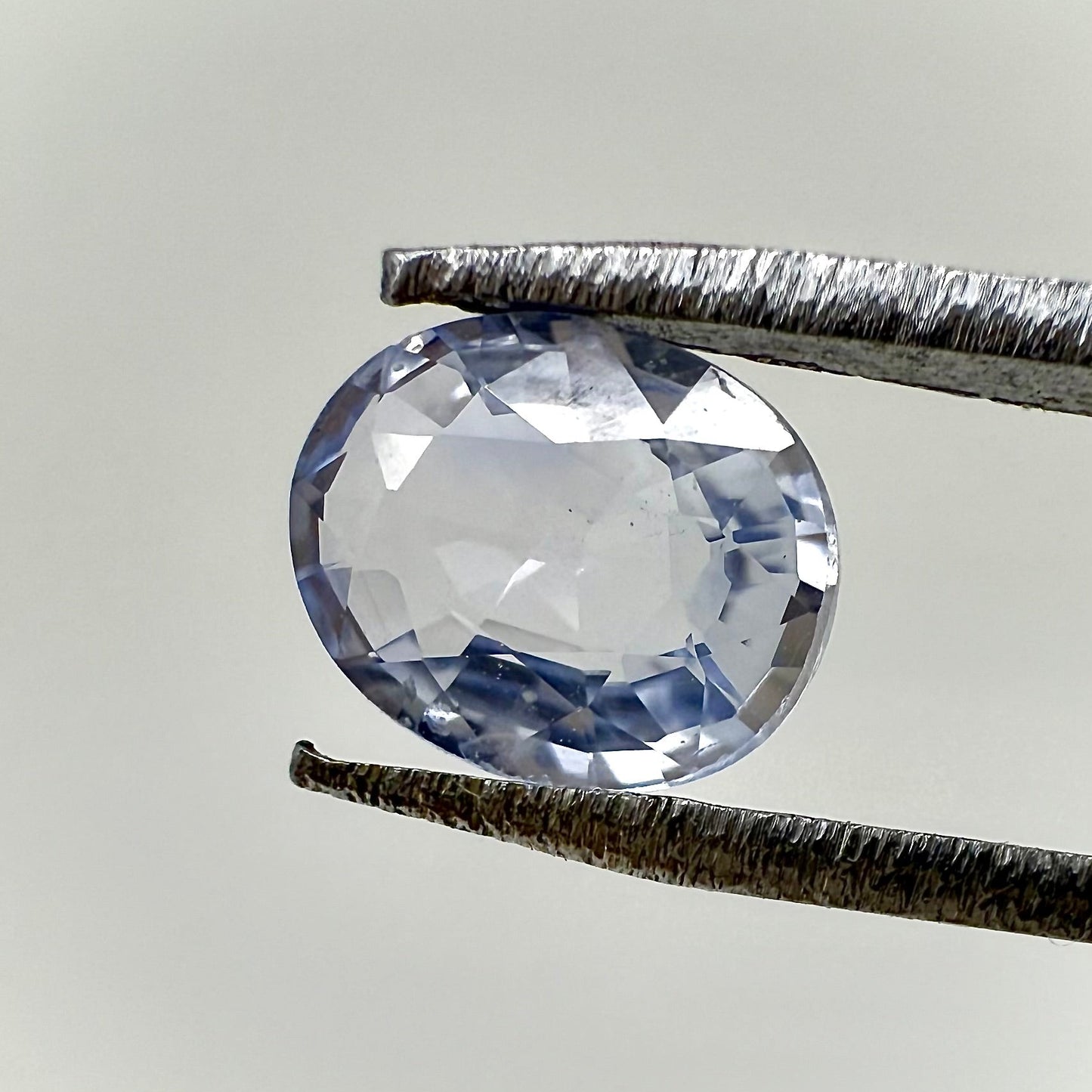 Bi-Color (White Pale Blue) Sapphire Oval 0.62 Ct