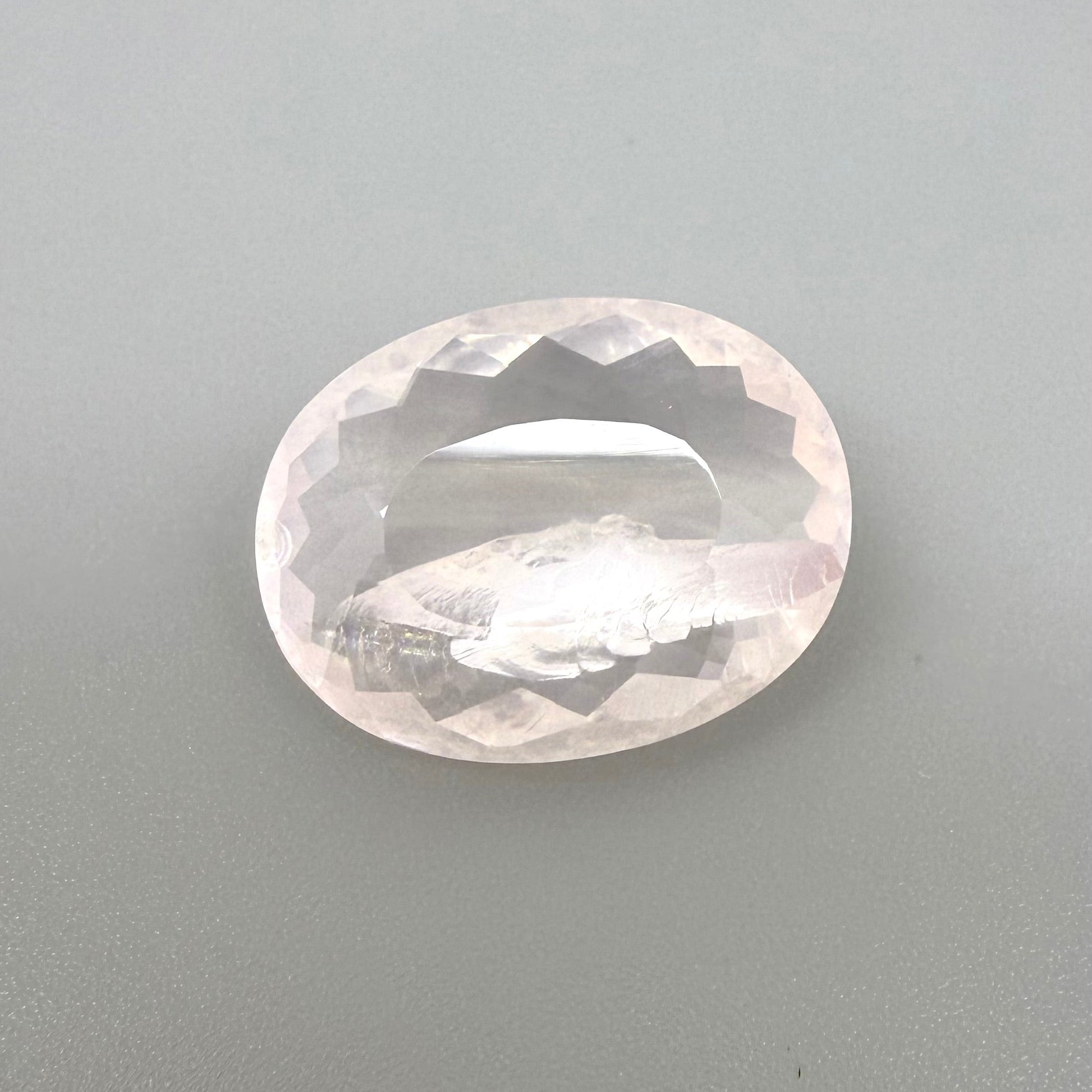 Loose Pale Pink Rose Quartz gemstone, oval shape