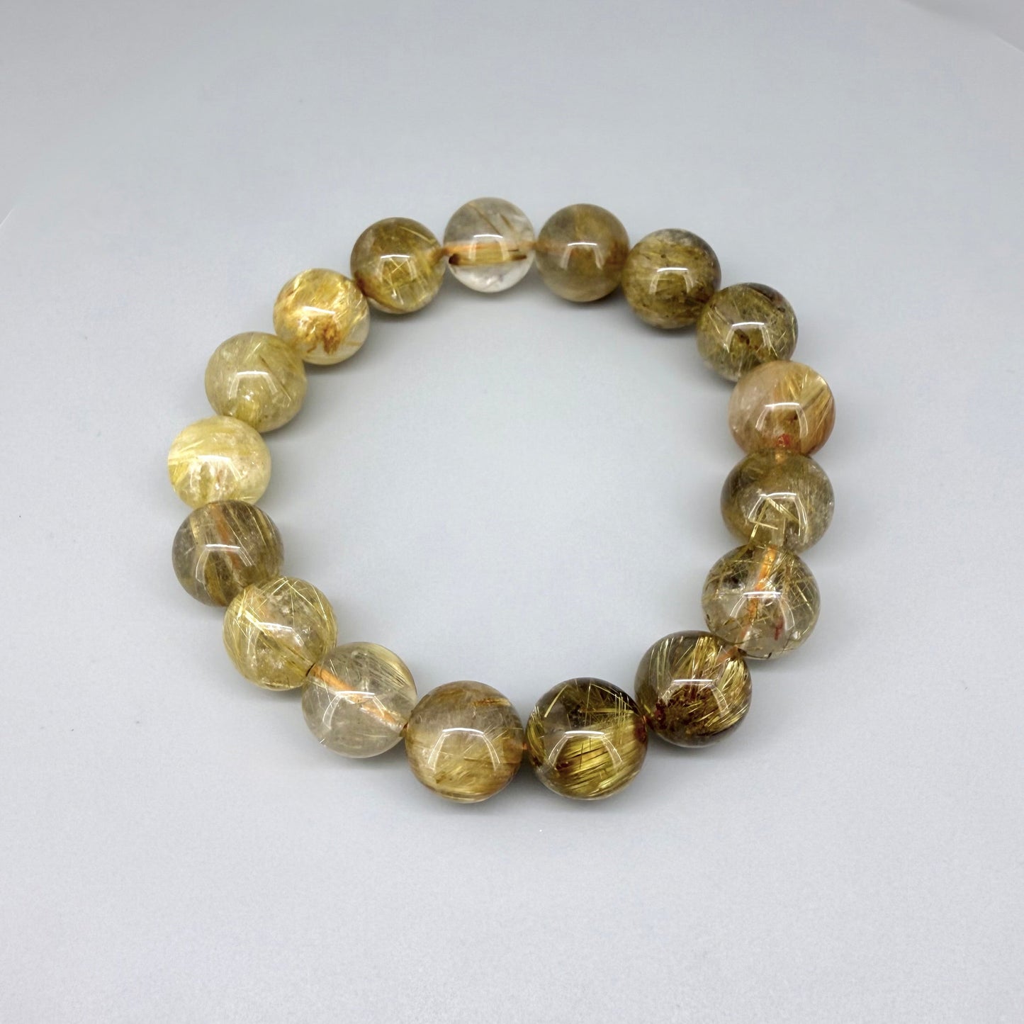 Rutilated quartz beaded bracelet, 18cm, natural gemstone beads with golden rutile threads on elastic stretch band